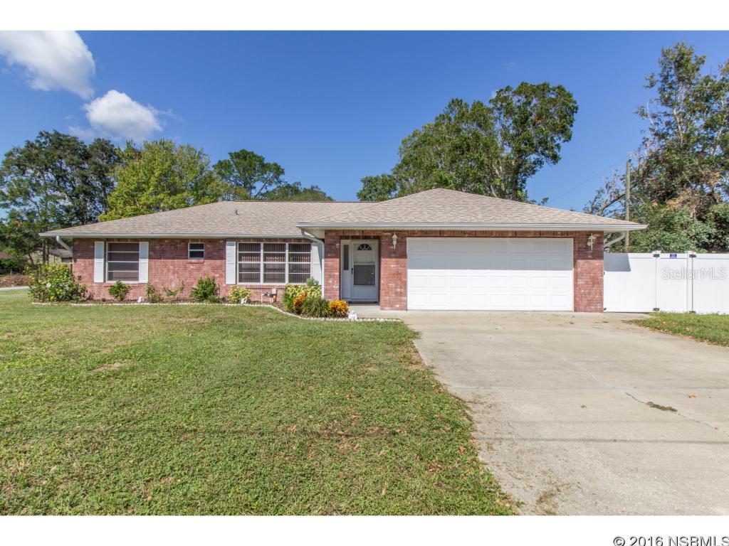Under contract taking backups. From the moment you walk in the front door, this meticulously maintained home invites you with a spacious open split bedroom floor plan that is sure to please. This 3 bed 2 bath 2 car garage concrete block home features vaulted ceilings, a gorgeous kitchen with granite counter tops, large screened porch that is perfect for entertaining, vinyl fenced back yard with storage shed, 2 year old A/C, plenty of natural light, 120x125 corner lot with great curb appeal and more. Located just minutes to schools, shopping, river, beaches and I-95. This is the home you've been looking for! ;Water: City