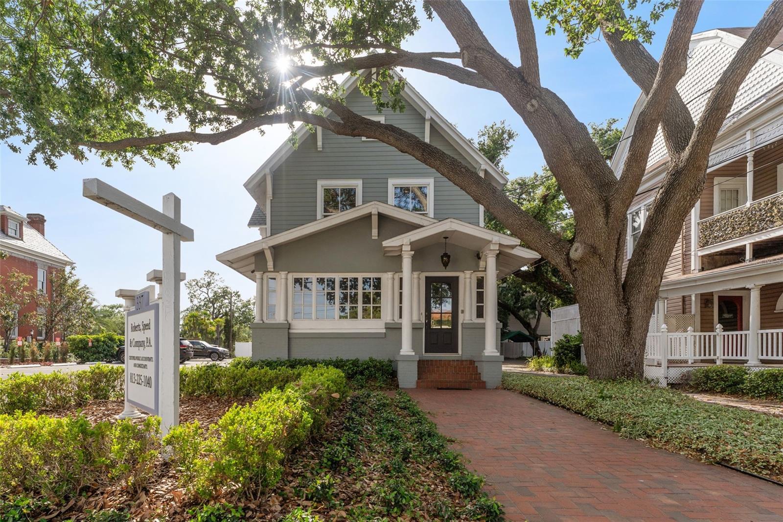 Under contract-accepting backup offers. Welcome to an exceptional opportunity in the heart of South Tampa! Originally built in 1900, this iconic Hyde Park property has been completely renovated to meet modern standards while preserving its timeless character and charm. Perfectly positioned one block to Bayshore Blvd, a half mile to vibrant Downtown Tampa, and 1 mile to Hyde Park Village, this location offers unmatched convenience and prestige.
The RO-1 zoning allows the property to have flexible residential/office uses. Currently utilized as a professional office space, the property features a flexible layout that could be used as a combined live-work arrangement, high end coworking space, or with reconfiguration transformed into a stunning single-family residence.  If you're a CEO looking to relocate your firm or headquarters, this is a rare chance to secure a one-of-a-kind property that reflects the prestige and success of your business.
 With high ceilings, beautiful hardwood floors, and expansive windows that flood the interior with natural light, every detail has been thoughtfully updated to blend historic elegance with modern functionality.
The building offers ample parking, lush landscaping, and an inviting front porch that adds to its classic curb appeal. Whether you're seeking a distinctive office environment, a luxurious home, or a live-work opportunity, this one-of-a-kind property provides endless potential in one of Tampa’s most sought-after neighborhoods.
High and dry with NO Flood Insurance required! Don’t miss the chance to own a piece of history, steps away from top dining, shopping, parks, and all the excitement South Tampa has to offer!