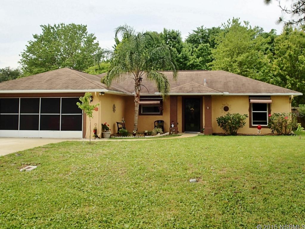 Very nice, move-in condition 3 bedroom, 2 bath concrete block home in Florida Shores featuring vaulted ceilings with plant shelves, a large kitchen with lots of counter space and a breakfast bar, an inviting open floor plan, indoor laundry, screened back patio with pet door, and a nicely landscaped, shaded backyard with privacy fencing, fruit trees and a large storage shed. The 2-car garage is screened and has pull-down stairs for attic storage. The AC was replaced in 2013 and the home is very well maintained. (Listing information thought to be reliable but is not guaranteed to be accurate; you are advised to verify the facts that are important to you.) ;Water: City