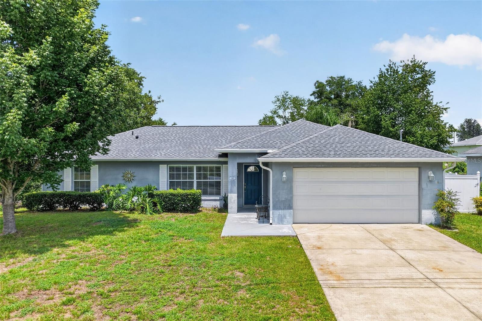 Welcome to 135 Juniper Loop, a move-in ready 3-bedroom, 2-bath gem tucked into Silver Springs Shores that's just waiting for its next owner! This solid concrete block home got a total glow-up before hitting the market: newer roof, newer AC, sparkling new stainless kitchen appliances, and fresh carpet in the bedrooms, so you can skip the to-do list and start unpacking. The open living room flows straight into a sunny dining area, and out back you've got your own screened lanai overlooking a big, fully fenced yard, perfect for cookouts, morning coffee, or letting the pups run wild. The primary suite comes with a dual-sink bath for zero morning arguments over mirror space, and the attached 2-car garage means room for the truck, the toys, and everything in between. Sitting on a quarter acre with no HOA and no age restrictions, this place gives you space to actually breathe without anyone telling you what color to paint your mailbox. Homes like this don't sit around in this market long, so grab your agent, schedule a showing, and come see why this one's about to be somebody's favorite address!
