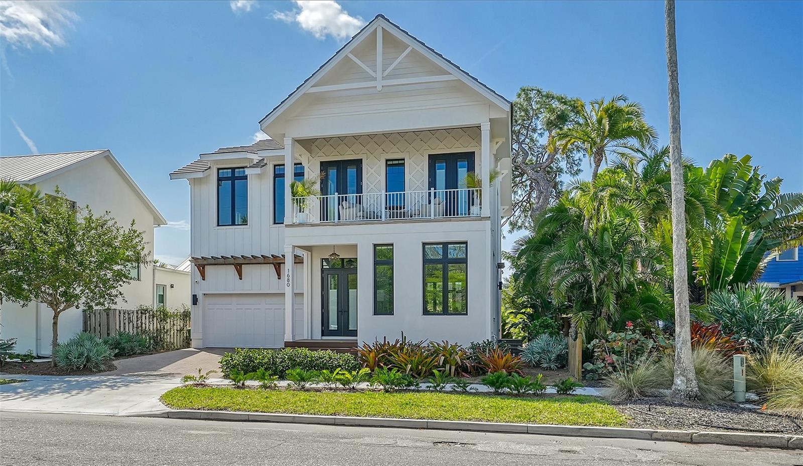 Prime location meets modern elegance in this stunning two-year-old custom home by John Cannon, nestled in the sought-after Laurel Park neighborhood. Boasting 5 bedrooms and 3.5 bathrooms across 2,900 sq ft, this meticulously designed residence is ideal for both comfortable family living and stylish entertaining. Natural light floods the open floor plan, complemented by soaring ceilings and tall windows that create a warm, inviting ambiance.  A chef’s kitchen serves as the heart of the home, featuring a 48” Aga dual-fuel range, Fisher & Paykel refrigerator, expansive island, breakfast nook, and premium cabinetry and countertops. On the second floor, the primary suite offers a walk-in closet, luxurious ensuite bathroom, and private patio with scenic views of Oak Street and downtown Sarasota. The spa-like primary bath is complete with dual vanities, a freestanding tub, and a spacious walk-in shower. Thoughtfully designed with contemporary finishes throughout, this home also offers stacked closets on the first and second floors, providing an option to install an elevator. Upstairs, in addition to the primary suite, there are four more bedrooms, a laundry room, and a cozy sitting area. The beautifully landscaped backyard, with space for a pool, is perfect for outdoor entertaining and enjoying the Florida sunshine. Located in the historic, walkable Laurel Park, you’re just steps from downtown Sarasota’s finest dining, boutique shopping, cultural venues, and more. Don’t miss the chance to own this exceptional home in one of Sarasota’s most desirable neighborhoods. Furnishings available separate from the real estate, excluding art and personal items.
