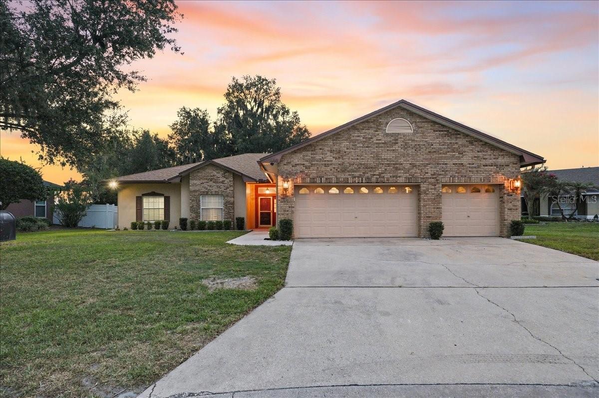 Nestled in a desirable gated community in South Lakeland, 448 Lake Harris Dr. offers the perfect blend of comfort, style, and waterfront living. Situated on an oversized corner lot, this meticulously maintained home features a beautifully updated kitchen, fresh interior paint, crown molding, updated lighting, a whole-home reverse osmosis system, a new roof (2017), and a versatile enclosed bonus room.
The spacious primary suite provides a relaxing retreat with a whirlpool tub and large walk-in shower. Outside, enjoy your private backyard oasis complete with a cocktail pool and the property's true showpiece—a private dock on Lake Harris, offering breathtaking sunset views and an unmatched waterfront lifestyle.

Additional highlights include an oversized three-car garage and a prime South Lakeland location close to shopping, dining, and major roadways. Don't miss this opportunity to enjoy beautiful lakefront living—schedule your private tour today.