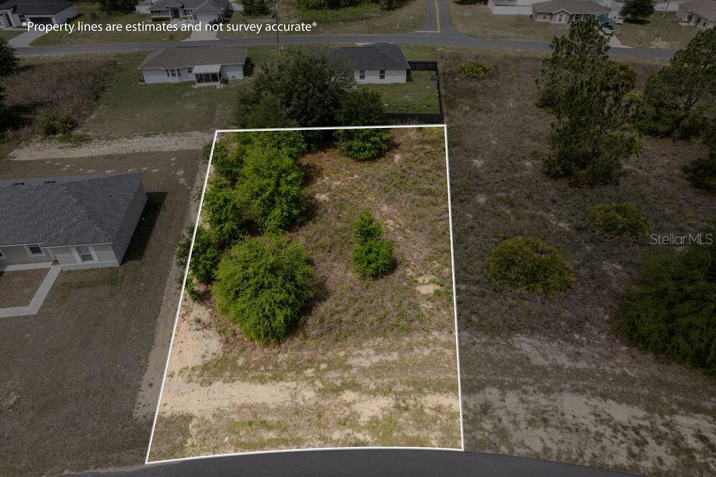 Excellent opportunity to own a vacant lot in Marion Oaks Unit 9! Mostly cleared and located on a great street surrounded by well-maintained new construction homes. This high and dry lot is ready to build, PUBLIC WATER AND ELECTRICITY AT SITE. Septic will be needed.
Perfect opportunity for real estate investors or anyone looking to build in a growing and desirable area of Ocala.