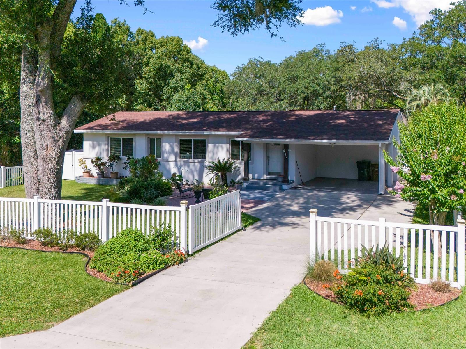 Experience the perfect blend of modern comfort and classic charm in this beautifully updated 3-bedroom, 2-bathroom residence located in the highly desirable SE Ocala Highlands. Step inside to find a warm, inviting floor plan featuring beautifully refinished hardwood floors, fresh paint throughout, and tastefully renovated kitchen and bathrooms. The thoughtful layout offers seamless flow from the welcoming entrance and formal living room into a separate family room, providing a highly versatile flex space ideal for a home office, media room, or play area. The true highlight of this exceptional property is the private backyard oasis, completely enclosed by a low-maintenance vinyl privacy fence and equipped with two storage sheds. Designed for year-round outdoor living and entertaining, it boasts a resurfaced pool within a screened enclosure, surrounded by gorgeous new decking that offers multiple distinct sitting and lounging areas. Nestled inside the Ocala city limits, this turnkey home offers an unmatched lifestyle just minutes from historic downtown Ocala, the Fort King Tennis Center, Ocala Golf Club, and Jervey Gantt Park.