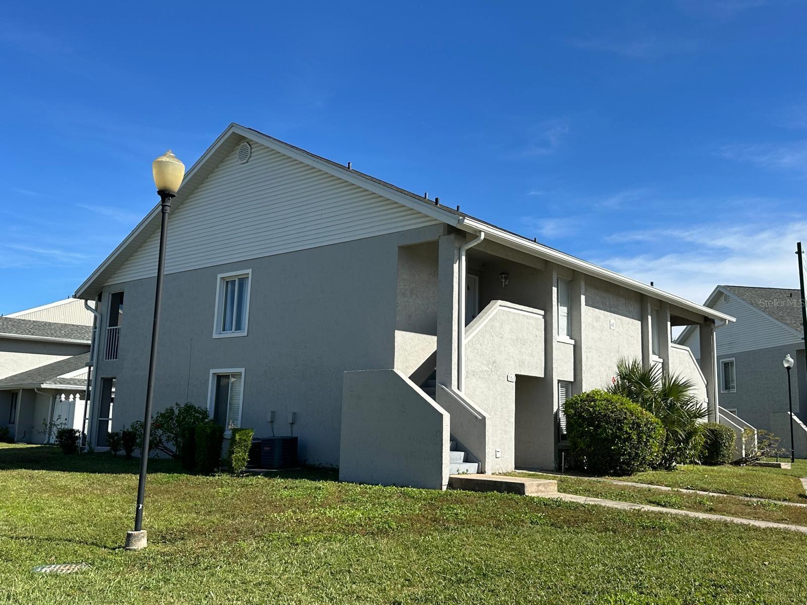 Welcome to this well maintained 2bds/2bth first floor corner unit in Pine Shadows community. LOCATION LOCATION! LOCATION!!  Close to all major highways, amenities, theme parks, medical facilities, Millenia Mall, Valencia College and downtown. Enter this light & bright unit to find a spacious kitchen to your left and bedroom to the right. Kitchen features lots of cabinets, laundry area with washer & dryer, breakfast bar opens to dining/great room. Washer & dryer are in the kitchen. Master Suite in the back are with spacious updated bathroom. Community offers pool, tennis courts, basketball court, racquet ball court, bbq area, pond and multiple walking paths. Current 12month lease in place. Buyer approval is required. Solid investment property with good rental history in a high demand community