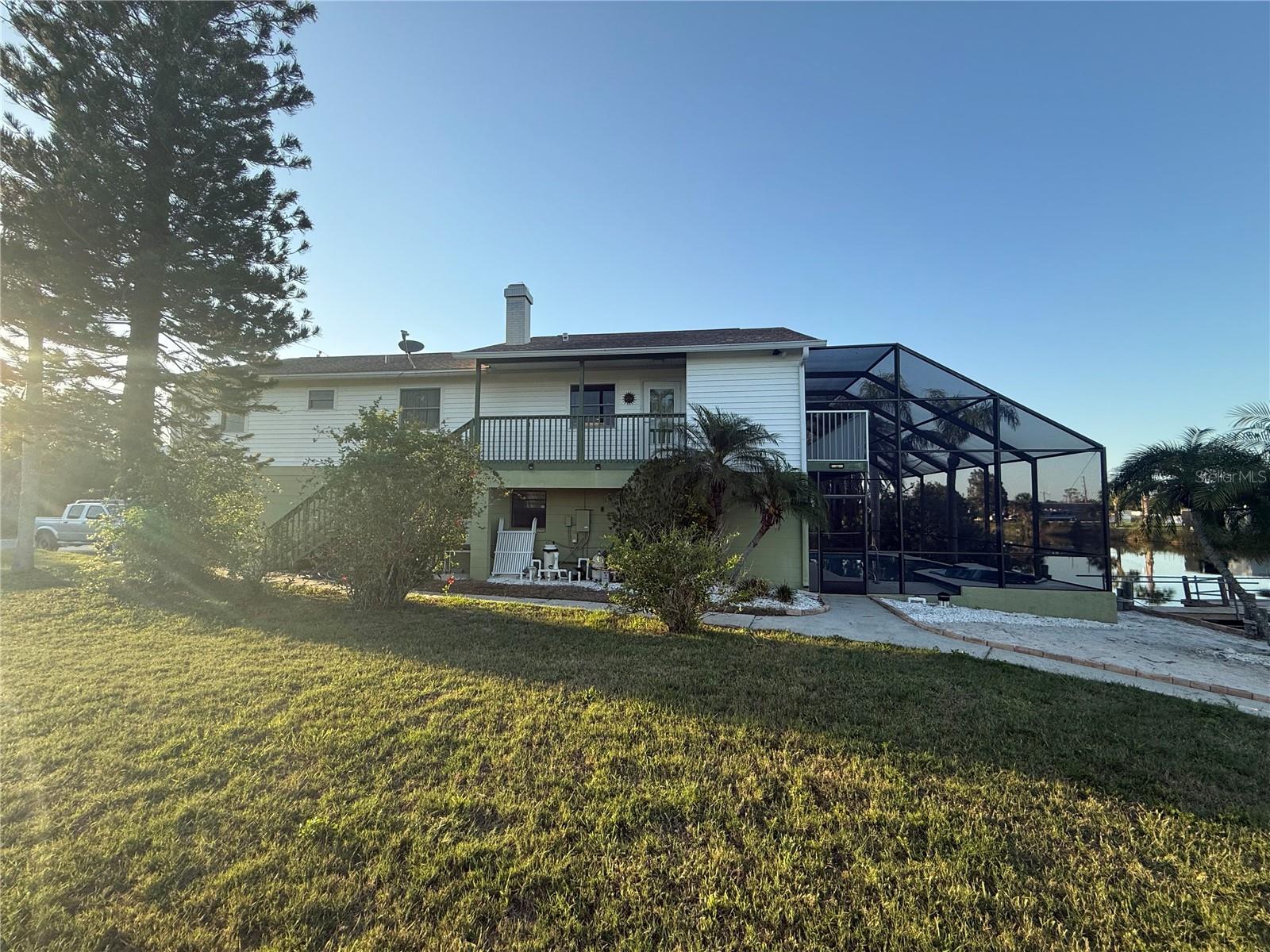 Fractional Ownership. Price Improvement! Now is your chance to own this Hernando Beach waterfront home ! Awesome elevator home has 4 bedrooms and three full baths. A gorgeous pool and views that last forever. This home boasts a Great Room With A Fireplace- Vaulted Ceilings- Eat In Kitchen With Newer Stainless Appliances- Corian Counters- Pantry- Master Bedroom Walk In Closet- A Wood Deck Overlooking The Canal And Pool Area- Inside Laundry- Lower Level has A Bedroom- Eat In Kitchen- Living Room- 2 Built In The wall Ac Units- Extras Include- Pool With A Waterfall, A 2nd. Covered Porch- - Ceiling fans- Roof November 2014- AC December 2014- Dock- Sea wall-Indirect Gulf Access Through A Boat Lift To The Gulf Of America .Come home to paradise! ALSO, Lot next door is also for sale by the same owner.