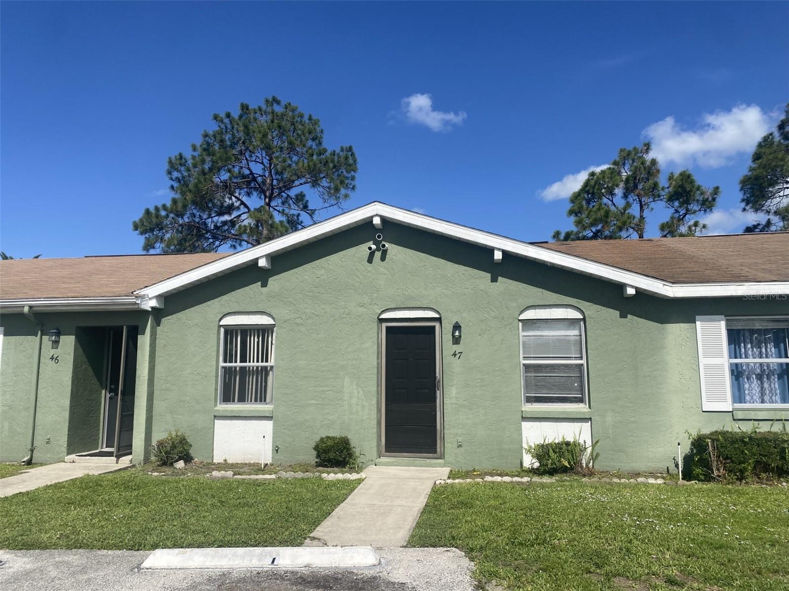 Location, Location, Location!!! This Villa is ideal for those seeking low-maintenance Florida living, offering a split floor plan with two bedrooms, two bathrooms, and a spacious kitchen. Enjoy the open living spaces with brand new carpet in a beautiful neutral tone. Kitchen equipped with plenty of cabinet space, all appliances and tiled floor. Inside utility space for your convenience and a spacious screen back porch. You will also enjoy the large community pool after a long hot summer day! You will love the convenience to restaurants, shopping, banks, major highways, area attractions, and Orlando International Airport (MCO). Must see!!!