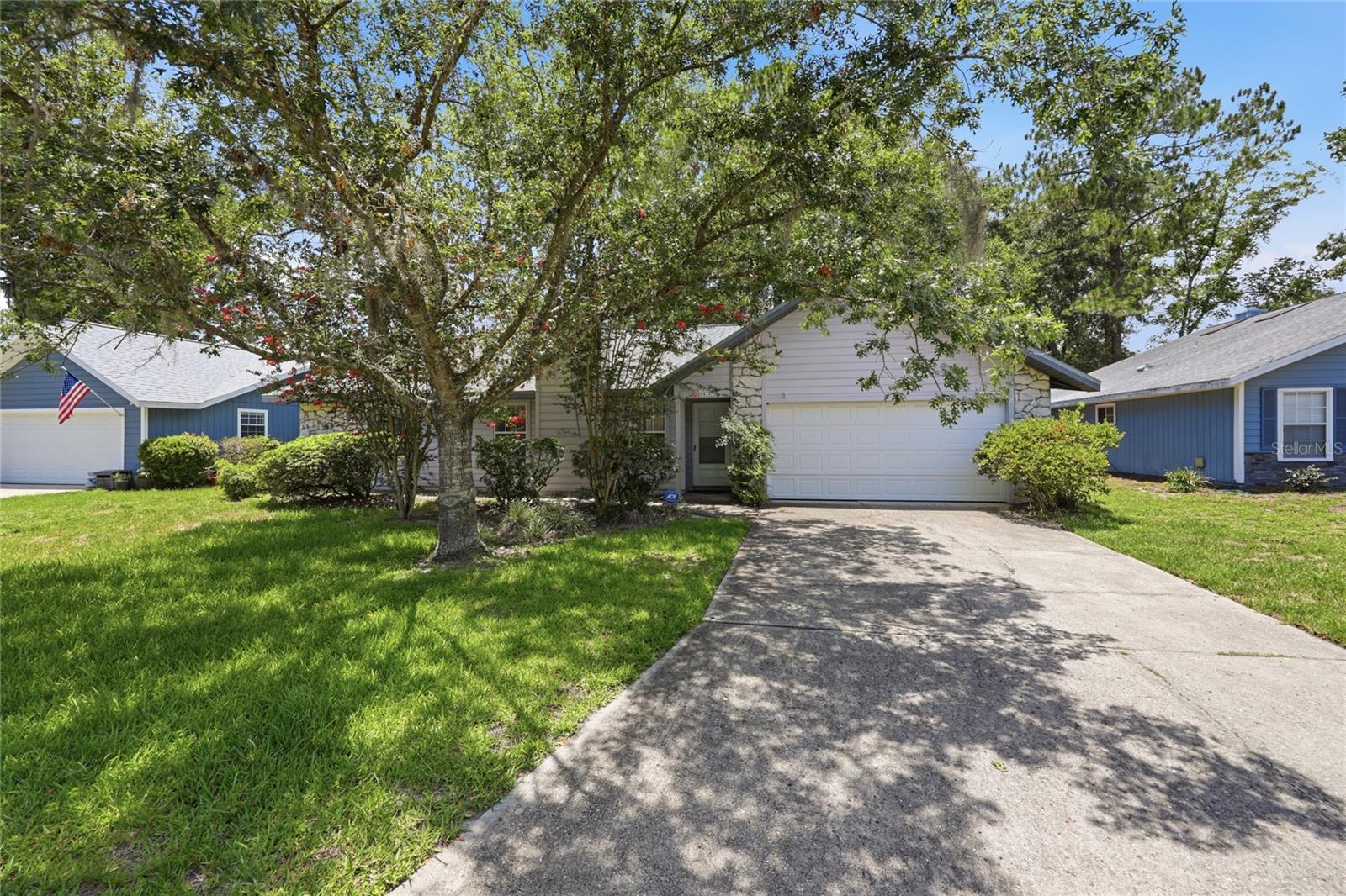 Come see this well-located 3-bedroom, 2-bath GW Robinson home with a 2-car garage in the heart of NW Gainesville. The home features a spacious living/family room with a wood-burning fireplace, a separate laundry room just off the garage, and a large screened porch overlooking the back of the home. The roof was replaced in 2024, and the home offers attractive vinyl plank flooring through most of the main living areas, with carpet in two of the bedrooms.The location is a major highlight, situated on a non-through street near Hunter’s Crossing, Millhopper Road, restaurants, shopping, and great schools. The community also offers a nice pool, basketball area, and park-like setting. This home is a great value in a truly convenient NW Gainesville location.