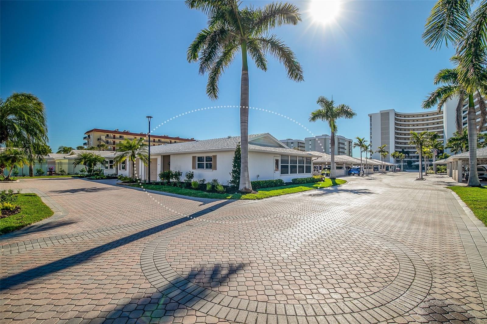 Everything is brand new in this beautifully renovated, turnkey furnished two bedroom, two bath end-unit villa offering an exceptional Siesta Key beach lifestyle just steps from the Gulf. The desirable split floor plan features spacious bedrooms, generous closets, and an open-concept living area filled with natural light, enhanced by a sun-lit Florida room. The updated kitchen is thoughtfully designed with granite countertops, a coordinating backsplash, soft-close cabinetry, and new stainless steel appliances. The primary suite offers a wall-to-wall closet, transom window, and sliding glass doors opening to the Florida room. Additional highlights include luxury vinyl plank flooring, all-new furnishings, and an attached one-car garage with washer and dryer plus ample storage for beach gear. Whether enjoyed as a private coastal retreat or a lock-and-leave rental opportunity, this residence truly offers the best of both worlds.

Crystal Sands is a well-managed, financially stable beachfront community that has remained highly desirable since 1969 due to consistent upkeep and thoughtful renovations. The condominium comprises a collection of one, two, and three bedroom villas along with a Gulf-front high-rise tower, all set within beautifully maintained grounds. Residents and guests enjoy private beach access with umbrellas and loungers, two heated swimming pools, a clubhouse, on-site rental management, and night security, all just moments from Siesta Key’s renowned dining and shopping.