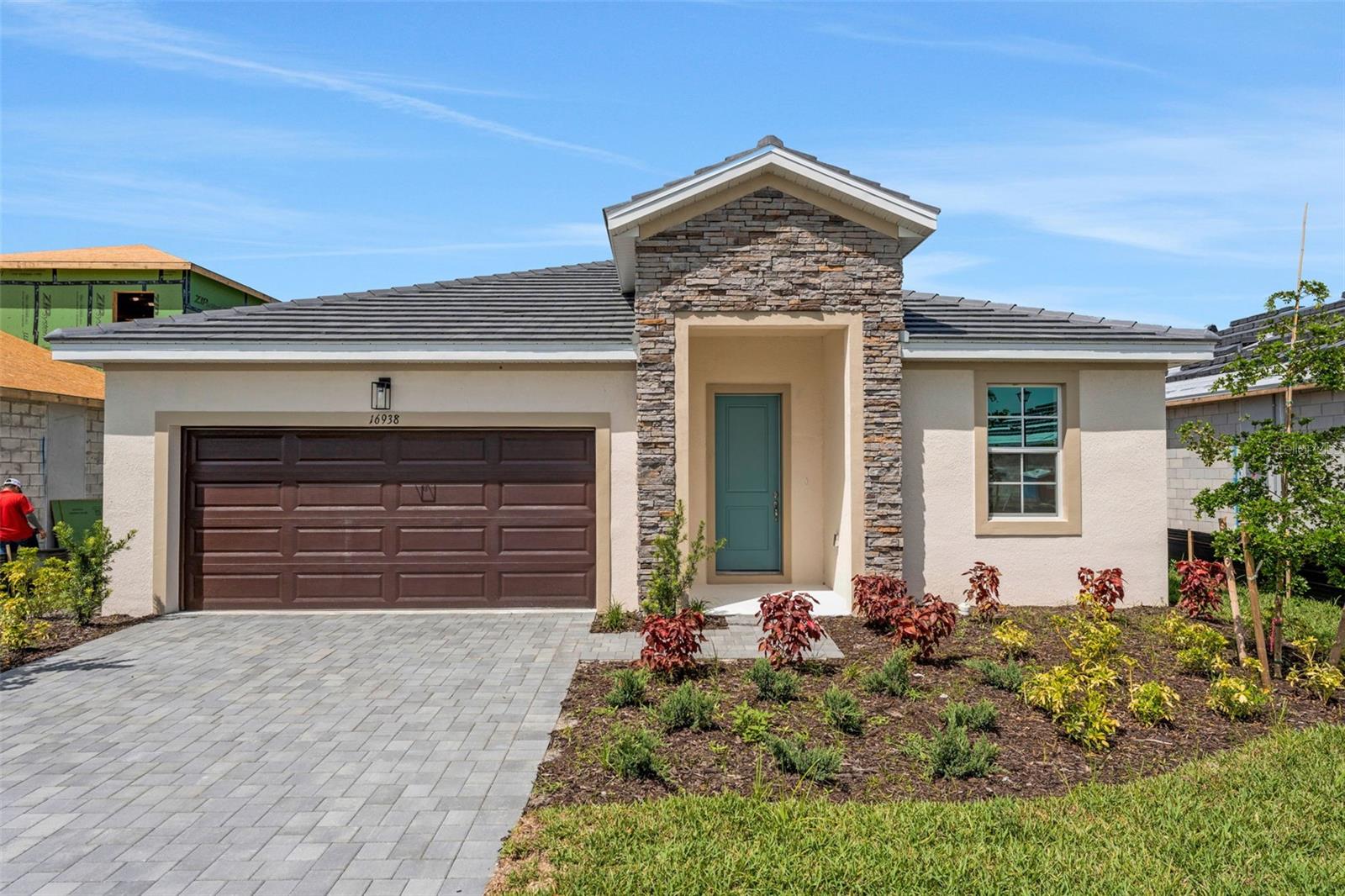 Virtually Staged. Discover refined Florida living in the Lucca model, located in River Hall Country Club. Set on an 8,873-square-foot homesite, this 1,971-square-foot residence features 3 bedrooms and 3 full bathrooms with a bright open-concept design. The main living area connects the gathering space, dining area, and kitchen with a large center island and walk-in pantry, creating an easy flow throughout. The private owner’s suite includes a walk-in closet, dual vanities, and a spacious walk-in shower. Two additional bedrooms provide flexible space options. River Hall Country Club offers a championship golf course, clubhouse, fitness center, resort-style pool, tennis, pickleball, bocce, cabanas, and walking trails.