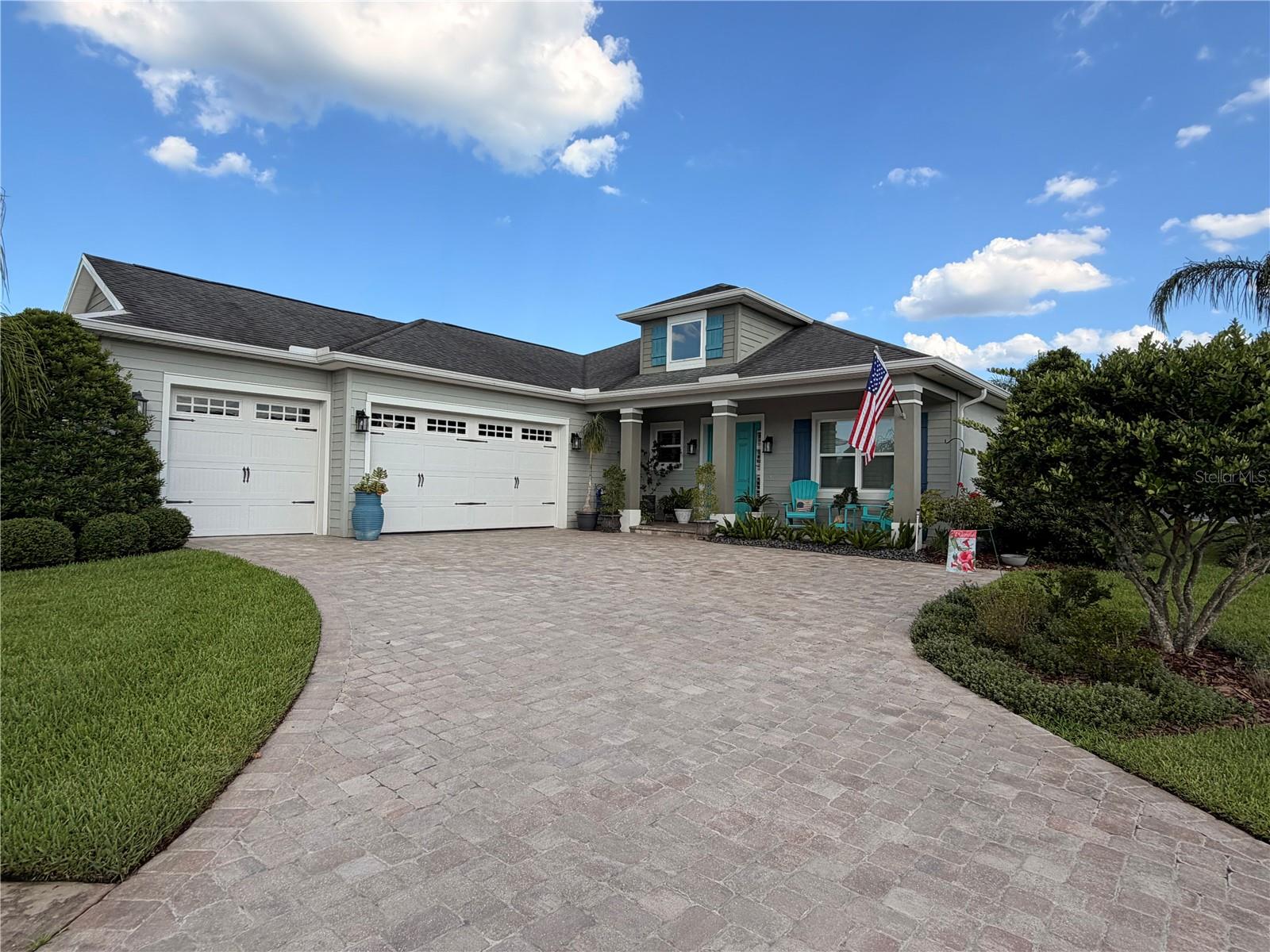 Located in exclusive Portofino Reserve gated community overlooking the Venetian Bay Golf course, within walking distance to the country club. The home sits on a oversized corner lot with an extended paver driveway and a 3 car garage with hurricane rated doors. The craftsman exterior features lap siding, stucco, and seamless gutter system. Large front porch and a covered lanai with pavers, pre-plumbed for an outdoor kitchen.  The yard features a butterfly garden, 15 palms and native Florida landscaping with automatic sprinkler system. There is also room for a swimming pool. The interior features ceilings 10-12' high 8' doors and plantation shutters throughout. Flooring includes porcelain plank tile in living areas and upgraded laminate in bedrooms. The great room features a large wood burning fireplace with a granite face and shiplap. Gourmet kitchen equipped with a large island, upgraded cabinets with soft close drawers, built in wine cooler. New microwave, dishwasher and disposal. The master bedroom has tray ceiling with oversized garden tub and his & her closets. Home includes a guest ensuite bathroom and third bedroom/flex room. Complete Air conditioning system replaced in 2025.