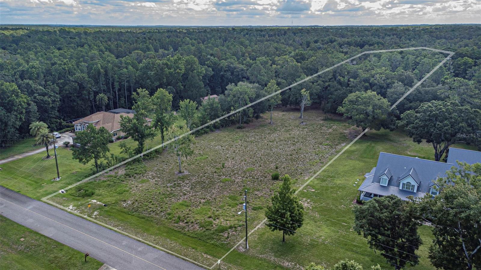 Located in the gated community of Homesteads of Saddlewood, this rare vacant homesite offers an exceptional opportunity to build your custom dream home on a spacious acreage property in a well-established, equestrian-friendly neighborhood. Believed to be the only available vacant lot in the community, the property has already been cleared and includes prior soil testing completed by the current owners, helping simplify future building plans.

Known for its peaceful country setting, low HOA fees, and minimal restrictions, Homesteads of Saddlewood allows residents the flexibility to enjoy barns, stables, and other equestrian amenities. Conveniently located near The Grove, KRATE at the Grove, Wiregrass Mall, multiple hospitals, and I-75, this property offers the perfect combination of privacy, space, and accessibility.