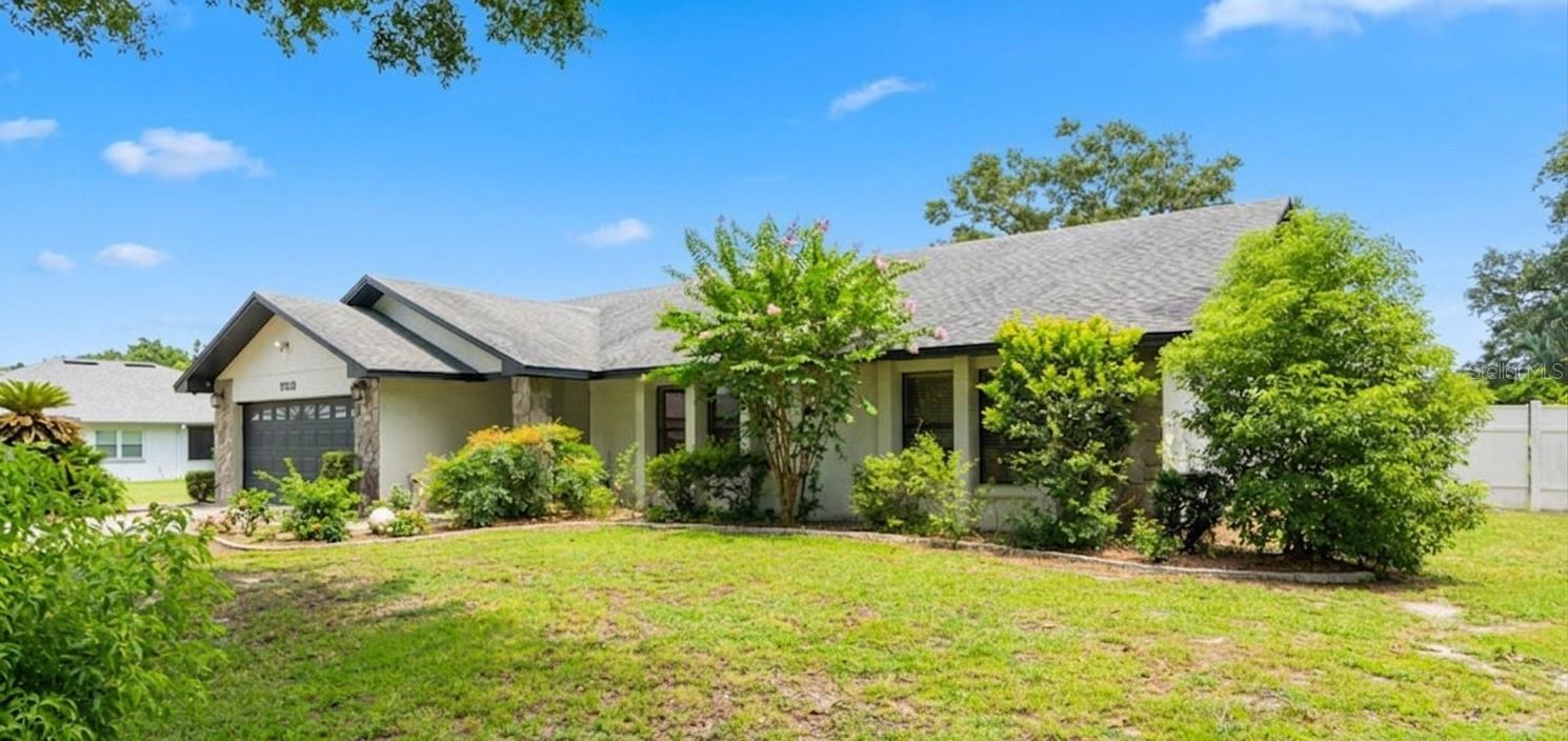 Stunning 3-Bedroom, 2-Bath Pool Home with Wood Burning Fireplace and Large Lanai in Prime North Lakeland!

Welcome to 7213 Regent Drive, nestled in a gorgeous, tight-knit community where neighbors greet each other and wave as you drive by. From the moment you step through the front door into the beautiful tiled entryway with double coat closets, you’ll know this home is special.

Enter through the front door into a beautiful entry with upgraded tile and large double coat closets.  To your right, a spacious living room boasts soaring vaulted ceilings and abundant natural light, flowing effortlessly into the formal dining room with direct access to the lanai. The nearby primary suite is a true retreat, featuring an incredible bathroom complete with double sinks and a fully remodeled rain shower equipped with bluetooth lights, built-in music, and a seating bench.

The heart of the home features a large kitchen with abundant cabinet space plus a pantry, upgraded tile floors, and bright new recessed lighting. Enjoy cooking while looking out the kitchen window to the backyard, or gather in the adjacent dinette. This flows beautifully into a stunning family room anchored by a cozy wood-burning fireplace, built-in bookshelves, and gorgeous upgraded lighting. Two large guest bedrooms and a beautifully updated second bathroom occupy their own wing of the home, while an indoor laundry room with a utility sink connects you to the garage.

Step outside into your own private oasis. The oversized, fully fenced backyard boasts mature landscaping, an expansive screened lanai, and a magnificent, deep swimming pool housed under a brand-new, ultra-spacious screen cage. Cozy up on cool evenings next to the custom firepit nestled under a decorative pergola, or make use of the immaculate storage shed/workshop.

Nearly every detail of this home has been meticulously upgraded, including:

Major Systems: Updated roof, plumbing, brand-new septic drainfield and lift station.

Interior & Mechanics: Remodeled primary and guest bathrooms, new stainless appliances, upgraded kitchen/bath recessed lighting, upgraded ceiling fans throughout, blinds, and garage door opener.

Exterior Improvements:  Painted exterior, resurfaced pool, upgraded spacious pool cage, and even a new roof on the workshop!

Only 15 minutes from downtown Lakeland and easy access to I-4, this home comes complete with a charming herb garden, decorative plant shelves and much more! This turn-key property is just waiting for its next chapter. Make your appointment to view this stunning slice of Florida paradise today!