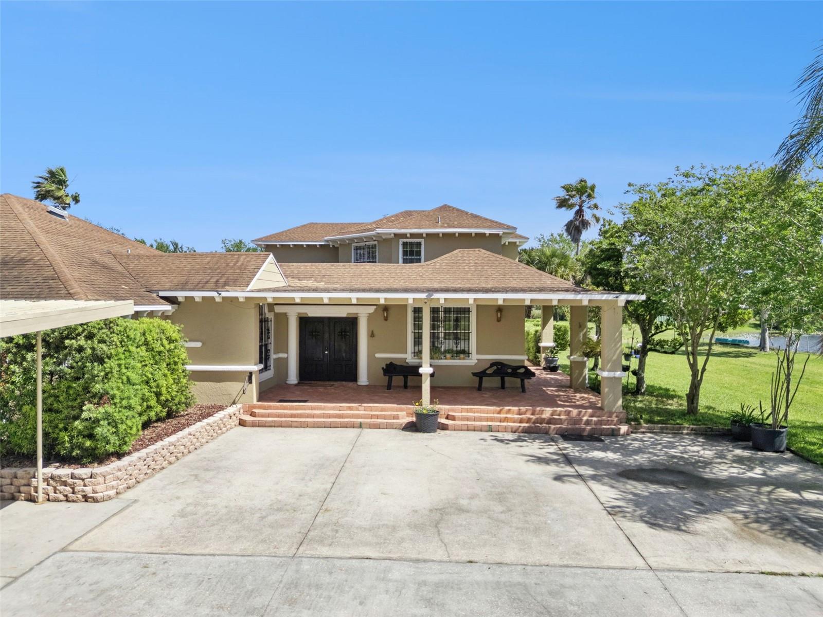 Welcome to 5825 Lake Lizzie Dr, a private St. Cloud property situated on approximately 9.6 acres, offering a strong combination of land, location, privacy, and lifestyle features. This property provides the type of acreage that is increasingly difficult to find in Central Florida, especially with convenient access to Lake Nona, Medical City, Orlando International Airport, shopping, dining, schools, lakes, parks, and major roadways.

The home offers comfortable living areas, natural light, and a practical floor plan designed for everyday living, gathering, and long-term use. The nearly 10-acre site provides significant outdoor space for recreation, gardening, additional parking, storage, equipment, boats, trailers, or simply enjoying a more private setting with room to spread out.

A major highlight of the property is the outdoor living area, featuring a pool and an outdoor kitchen area designed for enjoyment, gatherings, and entertaining. The property also includes a designated area for chickens, adding another practical use to the land for those who appreciate outdoor living and a more self-sufficient lifestyle.

The property’s size and setting create a clear difference when compared to typical residential lots. Mature trees, open areas, and natural surroundings help provide privacy while still keeping the property within reach of key Central Florida destinations. For buyers looking for acreage, usability, outdoor living, and location in the St. Cloud area, this property deserves serious consideration.

5825 Lake Lizzie Dr offers a practical balance of space, privacy, functionality, and lifestyle. Schedule your private showing today to evaluate the home, land, pool area, outdoor kitchen, designated chicken area, and overall opportunity in person.