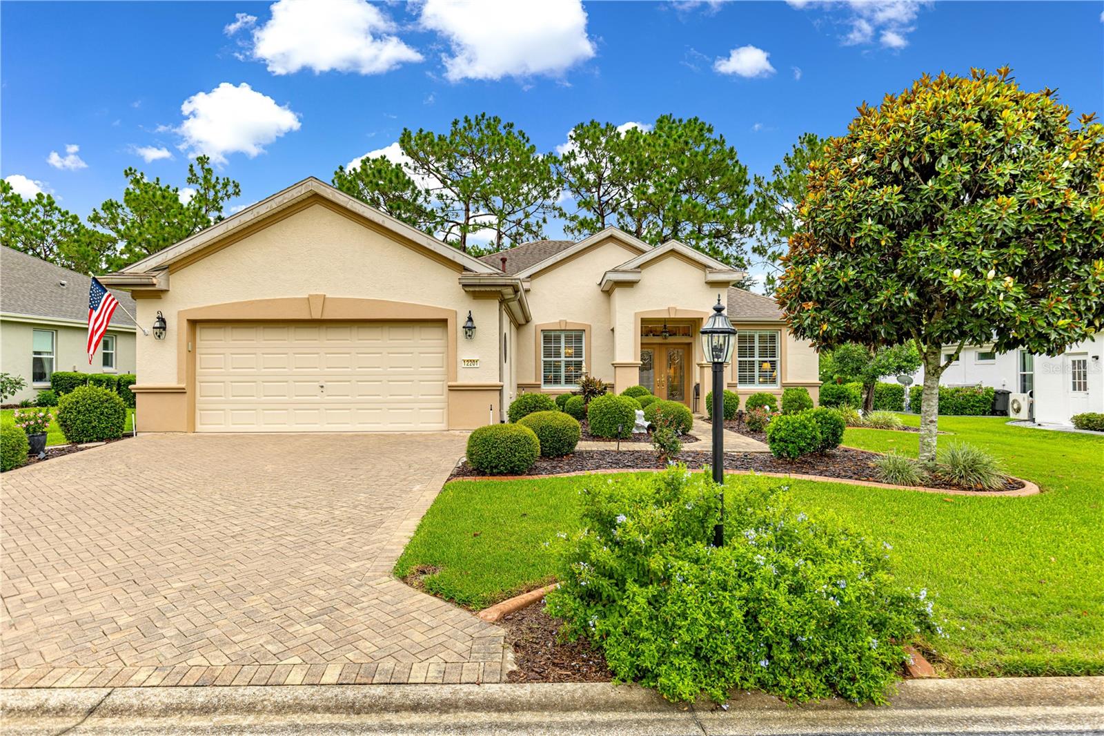 Beautifully Updated Johnstown Model in Del Webb Spruce Creek Golf & Country Club – A Must-See!

Welcome to this stunning Johnstown model offering 2,120 square feet of beautifully updated living space in the highly sought-after Del Webb Spruce Creek Golf & Country Club. This exceptional home features 3 bedrooms, 2 bathrooms, and a private den/office with elegant glass doors, making it perfect for both everyday living and working from home.

From the moment you arrive, you'll be impressed by the impressive double-door entry with custom decorative glass inserts. Inside, you'll find plantation shutters throughout, crown molding throughout the entire home, and beautiful luxury vinyl plank flooring and tile with no carpet.

The spacious kitchen is designed for both function and entertaining, featuring Corian countertops, new stainless steel appliances, a large center island, and a sunny breakfast area.

The generous primary suite offers new luxury vinyl plank flooring and a large walk-in closet complete with custom shelving and storage. The beautifully updated primary bath features a new granite vanity with dual sinks, updated faucets, and a new frameless glass shower enclosure.

Two additional guest bedrooms provide comfortable accommodations, while the spacious indoor laundry room offers abundant cabinetry and storage.

Major updates include:

Roof (2014)
HVAC (2018)
Hot Water Heater (2018)

Step outside to your spectacular 37' x 10' enclosed lanai, complete with custom window treatments and sun-blocking shades, creating the perfect year-round outdoor living space. The lanai opens to a gorgeous brick paver patio that matches the driveway and front walkway, all surrounded by professionally landscaped gardens and custom concrete curbing that enhances the home's outstanding curb appeal.

The oversized extended garage includes built-in cabinets plus a plywood-floored attic storage area, providing exceptional storage space.

Enjoy the unparalleled Del Webb lifestyle with amenities that include 36 holes of championship golf, three pools, two hot tubs, a restaurant and bar, fitness center, pickleball, tennis, softball, shuffleboard, billiards, card rooms, and nearly 100 clubs and activities. This vibrant community offers something for everyone.

This beautifully maintained, move-in-ready home truly has it all—schedule your private showing today!