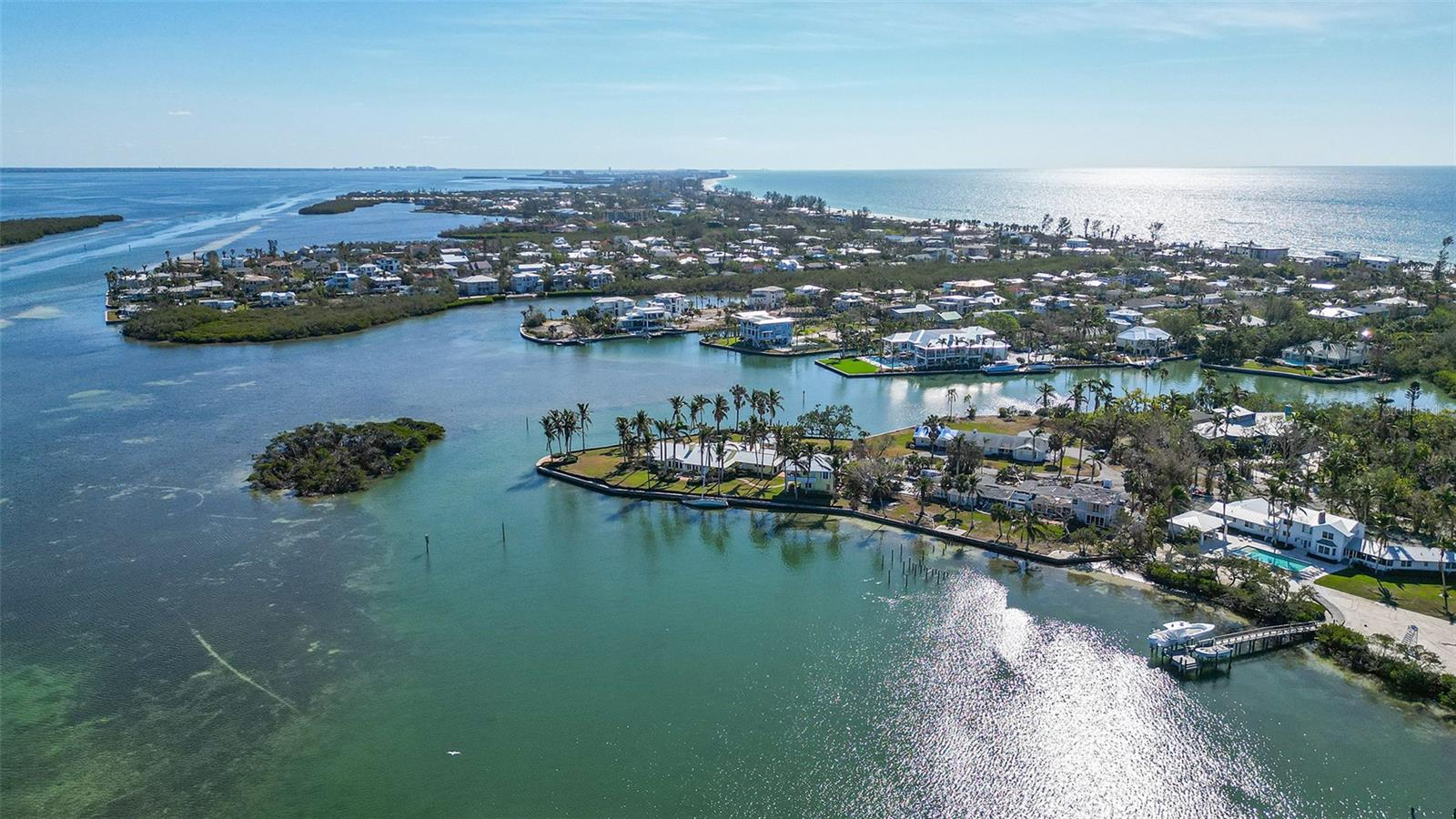 A Rare Opportunity to Own an Exquisite Bayfront Property on Longboat Key!
Discover an extraordinary chance to build the waterfront estate of your dreams on this sprawling estate-sized property located in the exclusive enclave of Bayou Hammock. Boasting an impressive 200 feet of direct bayfront access, this prime location offers unobstructed, forever views across the bay to the Intracoastal Waterway.
Immerse yourself in the natural beauty of the surroundings, where panoramic vistas of sparkling water are complemented by the serene sights and sounds of graceful seabirds, playful sea life, and gentle bay breezes. This private, secluded setting provides a rare blend of tranquility and prestige, making it the perfect canvas for a magnificent custom estate.
Whether you envision a grand waterfront mansion, lush tropical landscaping, or a private dock to fully embrace the boating lifestyle, this property offers endless possibilities. Don't miss this once-in-a-lifetime opportunity to secure one of Longboat Key’s most coveted bayfront addresses.
For those who value privacy, elegance, and breathtaking waterfront views, this property represents an unparalleled offering. Walking distance to the beach and many fine restaurants and shopping.