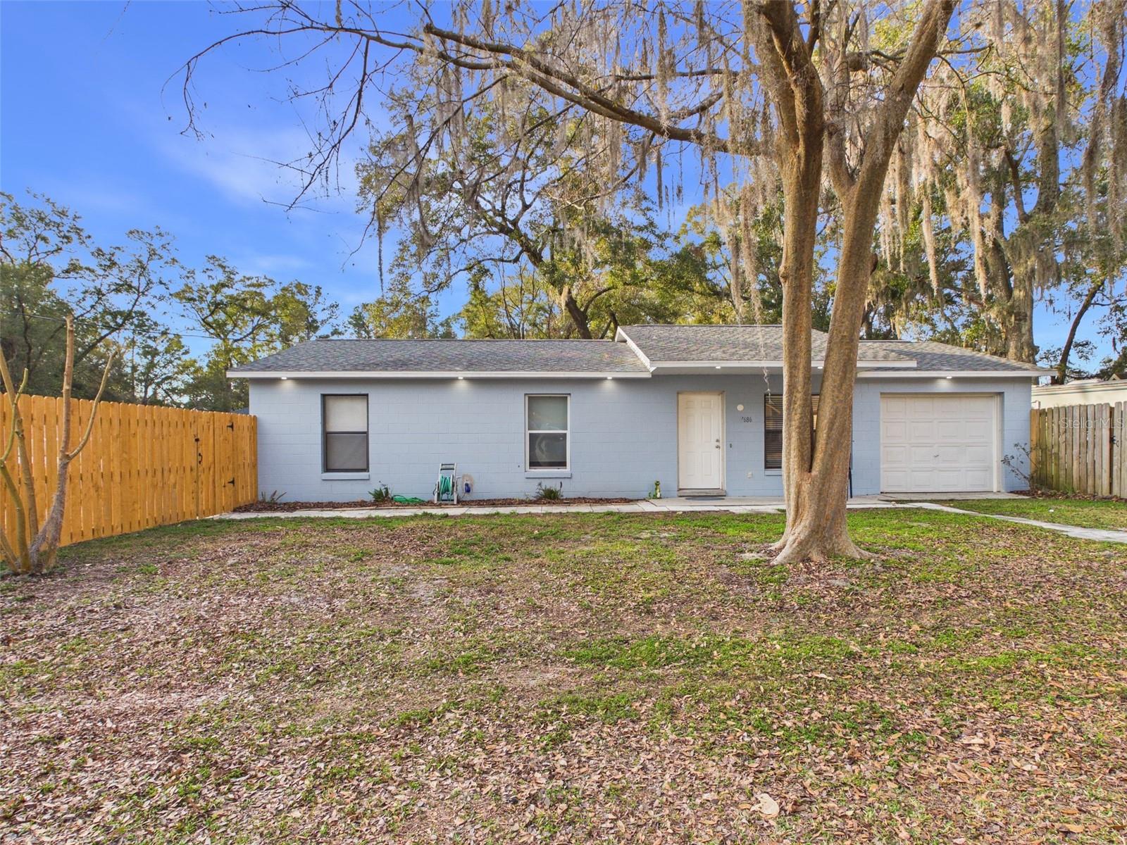 Discover the perfect blend of convenience and peaceful country living in this beautifully updated 3-bedroom, 2-bath home with a 1-car garage,situated on a spacious 1/3-acre lot in a serene SW Ocala neighborhood. Step inside to an inviting open-concept floor plan filled with natural light,ideal for both everyday living and entertaining. The private primary suite features an ensuite bath with a stunning tiled walk-in shower, offering aspa-like retreat at the end of the day. Enjoy the privacy and outdoor space your oversized lot provides while still being just minutes fromshopping, dining, and I-75 for an easy commute. Outdoor enthusiasts will love the proximity to the Rainbow River and the World EquestrianCenter, making this home perfectly positioned for both relaxation and recreation. Experience comfort, space, and location all in one exceptionalopportunity.