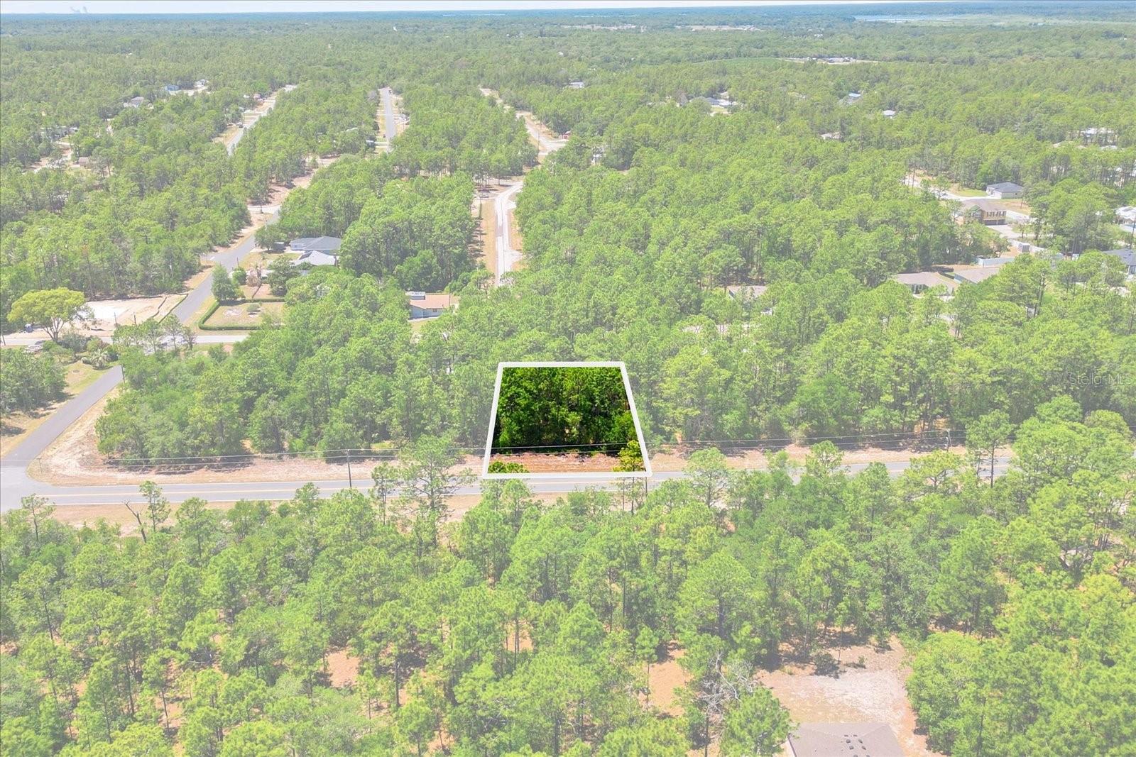***Public Water*** Nestled on the quieter northern stretch of Elkcam Blvd, this Citrus Springs homesite offers the perfect balance of privacy, convenience, and peaceful surroundings. With minimal through traffic compared to the busier southern portions of Elkcam, you’ll enjoy a more relaxed setting while still being just minutes from shopping, schools, golf, and the Rainbow River. Located in the growing community of Citrus Springs, this property provides an excellent opportunity to build your dream home in an area known for its natural beauty, larger homesites, and easy access to outdoor recreation. Whether you’re looking for a future homesite, investment property, or peaceful Florida retreat, this lot checks all the boxes. *Property lines are for illustration purposes only*. No assignable offers will be considered.