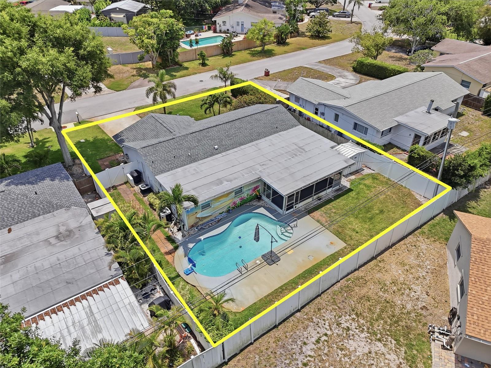 One or more photo(s) has been virtually staged. Don’t miss this rare opportunity to own a single-family home with a private POOL in a NON- flood zone perfectly situated centrally in Pinellas County! This 3-bedroom, 2 bathroom, 2-car garage home offers an open and functional layout ideal for first-time homebuyers, families, or anyone looking for a Florida pool and total freedom with no HOA. Step into a spacious living area with beautiful abundant natural light. This charming home is a split plan offering family room and living room, screened patio, The oversized, fully fenced yard includes an in-ground pool home is beautifully landscaped offering a perfect blend of indoor comfort and outdoor Florida lifestyle. Whether you're looking for a starter home, a family home, or a vacation property, this one check all the boxes. Schedule your private showing today—homes like this at this price don’t last long! The soft sands and turquoise waters of the Gulf beaches are less than 10 minutes away, making spontaneous sunset walks, weekend beach days, and coastal dining part of your daily routine. This proximity also makes the home well-suited for both a personal residence and an investment property focused on Florida’s strong beach-driven demand. Active living is woven into the neighborhood. Just minutes away, the Southwest Recreation Complex offers a heated Olympic-size swimming pool, fitness programs, and lighted baseball and softball fields. The complex also provides access to pickleball and tennis courts, perfect for morning matches or evening games with friends. Nearby, the Largo Sports Complex features multiple athletic fields and open green space for soccer, fitness activities, and community events. Located in the heart of Largo, Florida, this home keeps you close to local parks, shopping, dining, and everyday conveniences while still delivering the laid-back coastal energy that makes the area so desirable.