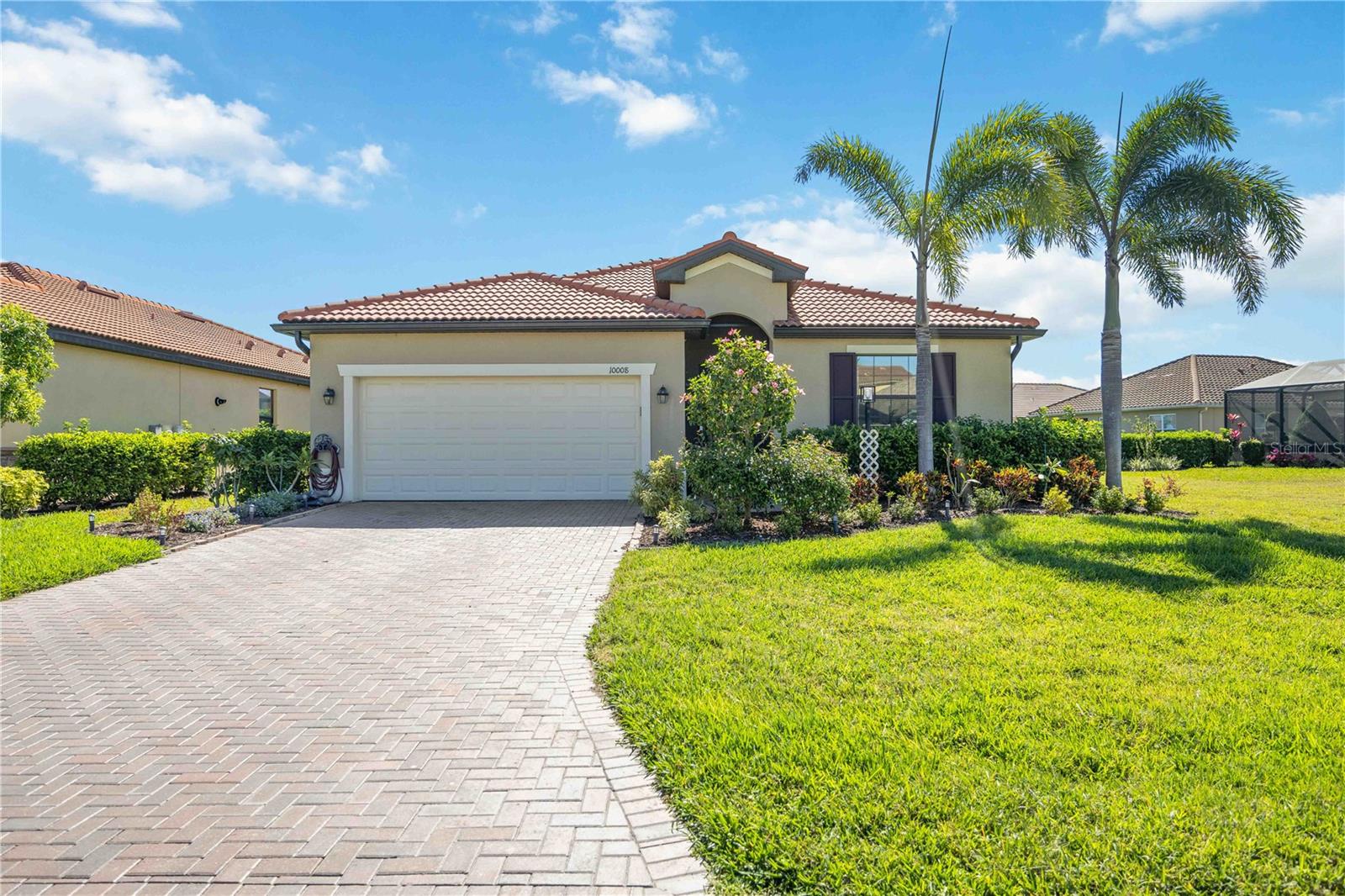 Your Dream Home Awaits!

**This home comes equipped with premium upgrades, including a WHOLE HOUSE GENERATOR & HURRICANE SHUTTERS—ensuring uninterrupted comfort and security during any storm, and offering true peace of mind year-round.**


This pristine corner lot home in The Links at Rosedale exudes charm and decorative style, offering a perfect blend of elegance and functionality. The standout kitchen features a beautiful backsplash, granite countertops, and ample space for culinary creativity. The third bedroom is ideal for a home office or guest room and can easily be converted back to a bedroom. The lovely primary suite is a true retreat, complete with a spa-like bathroom and a spacious walk-in closet. Beautiful tile floors flow through the main living areas and all the bedrooms.

Step outside to your private outdoor oasis, overlooking the lake, creating the perfect setting for relaxation and entertainment. The HVAC system includes an air purification system (HALO IAQ 2025). Additional upgrades include a whole-house generator, hurricane shutters, sun control film on windows (tinted), sun shade on the lanai, outdoor lighting, wireless motion sensors under the kitchen cabinets, and an insulated garage door. Gorgeous landscaping adds to the serene and secluded atmosphere, making this home a true sanctuary.
Don’t miss the opportunity to experience this incredible home. Schedule your private showing today!
As a resident of The Links at Rosedale, you’ll enjoy an active country club lifestyle with a social membership that includes access to five Har-Tru tennis courts, a Junior-size Olympic swimming pool, a state-of-the-art wellness center, and a modern clubhouse offering a dining room, lounge, and bistro patio. Optional tennis and golf memberships are available. With community fees covering two manned gates, dog parks, internet, cable, and landscaping, plus no CDD fees, you’ll relish low-maintenance living. Centrally located in Bradenton/Lakewood Ranch, you are just minutes from I-75, Lakewood Ranch, the UTC Mall, Gulf-coast beaches, and the Sarasota/Bradenton International Airport.
