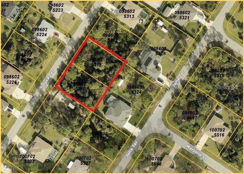 This double lot is nestled in a desirable neighborhood of newer homes, just off South Chamberlain Boulevard, offering an excellent opportunity to bring your dream home to life. Located in a continuously growing area of North Port, this property provides the perfect blend of space, privacy, and long-term potential, with everyday conveniences only 10–15 minutes away in the Murdock area.

North Port is well known for its natural beauty and unique attractions, including Florida’s only warm mineral springs, more than 80 miles of freshwater canals, and an abundance of nature trails ideal for hiking, biking, and horseback riding. The area is shaded by mature oak and pine trees and is rich in archaeological history, making it a wonderful place for those who appreciate both nature and a sense of place.

Conveniently situated between Tampa and Fort Myers, this location offers easy access to Gulf Coast beaches, entertainment, and major travel routes while maintaining a peaceful residential atmosphere. Whether you’re looking to build a forever home or invest in a growing community, this double lot opens the door to a lifestyle filled with outdoor enjoyment, comfort, and opportunity.