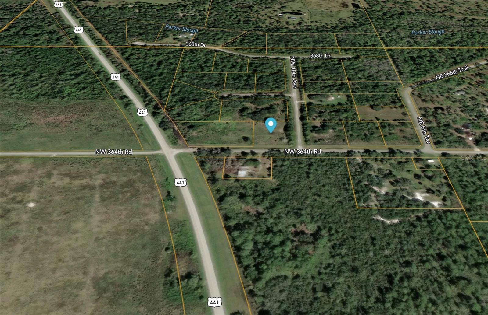 Build your Florida dream on this beautiful 1-acre corner lot in Okeechobee! Enjoy the privacy and peaceful surroundings created by mature pine trees while still benefiting from convenient access to major roadways. This high-and-dry property is located outside of a flood zone and comes with no HOA and no deed restrictions, giving you the freedom to build, park your RV, boat, or other recreational vehicles without unnecessary limitations.

A power pole is already located on the property, adding convenience for future development. Whether you're looking to build a full-time residence, a weekend retreat, or invest in Florida land, this property offers outstanding potential.

Ideally situated less than 9 miles from the Florida Turnpike, you'll enjoy easy access to South Florida, Orlando, and the Treasure Coast while still embracing the peaceful country lifestyle Okeechobee is known for. Enjoy nearby fishing, boating, hunting, and outdoor recreation, all while owning your own piece of Old Florida charm.