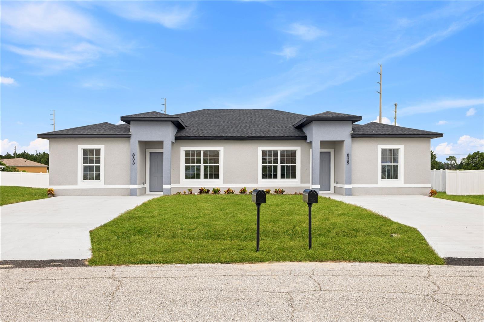 Residential Income Alert!

I have listed 3 additional duplexes in the same area that can be purchased together with this one.

This newly constructed duplex offers two units in a prime Poinciana location. Each unit features 3 bedrooms and 2 bathrooms, for a total of 6 bedrooms and 4 bathrooms. The property offers 2,832 sq. ft. under roof and is full of included upgrades.

Each unit features a welcoming open-concept floor plan with modern finishes, luxury vinyl plank flooring throughout, tiled bathroom floors, 9-ft ceilings, and energy-efficient windows. The kitchens include solid wood soft-close cabinets, luxury hardware, and a brand-new stainless-steel appliance package. The bathrooms include solid wood vanities, dual sinks in the primary bathrooms, tiled floor-to-ceiling showers, walk-in primary showers, and walk-in primary closets.

Additional features include a long driveway and covered lanai. This is a great opportunity for investors seeking new construction residential income properties in a growing area.