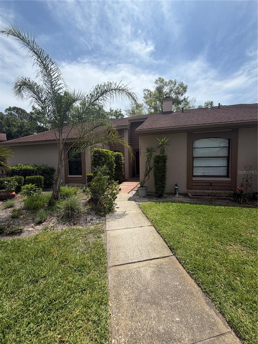 Welcome to 3409 Hillmoor Drive in beautiful Palm Harbor, where Florida's coastal lifestyle meets comfort, convenience, and charm. Nestled in a beautifully maintained condominium community surrounded by mature landscaping and peaceful walking paths, this inviting home offers the perfect opportunity to enjoy the relaxed lifestyle you've been dreaming about.

Imagine starting your mornings with coffee on your private patio before spending the day exploring nearby Gulf beaches, marinas, waterfront parks, and the charming downtowns of Palm Harbor, Dunedin, and Tarpon Springs. Whether you enjoy boating, kayaking, fishing, waterfront dining, or simply watching spectacular sunsets over the Gulf, you'll love living just minutes from some of the area's most desirable coastal destinations.

Inside, you'll find a comfortable, low-maintenance home designed for easy Florida living, while outside you'll appreciate the tranquil surroundings and pride of ownership throughout the community. With shopping, restaurants, golf courses, the world-famous Pinellas Trail, Honeymoon Island State Park, and everyday conveniences all within easy reach, this location truly offers the best of both relaxation and recreation.

Whether you're searching for a year-round residence, a seasonal retreat, or an investment in one of Tampa Bay's most desirable coastal communities, 3409 Hillmoor Drive delivers exceptional value and an unbeatable lifestyle.

Come experience Palm Harbor—where every day feels like a vacation.