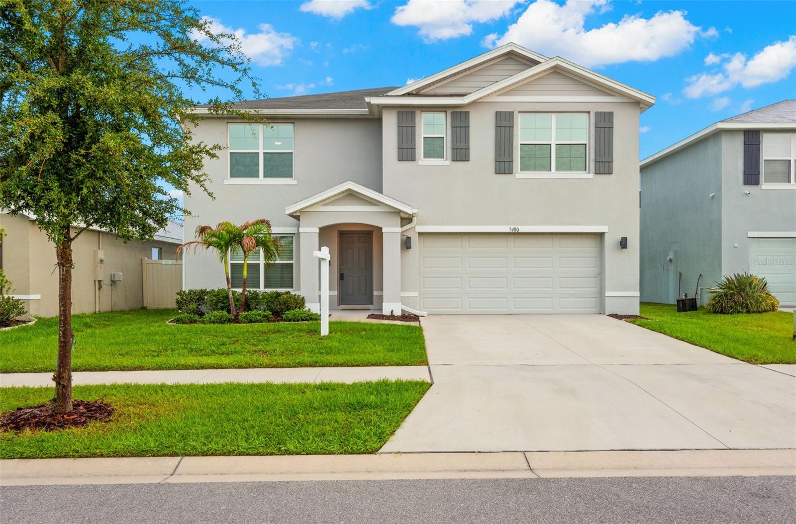 Virtually Staged. FHA, VA and USDA financing welcome, in addition to conventional loans! Built in 2022, this better-than-new, two-story BLOCK-ON-BLOCK home offers a low HOA, is located outside of a designated flood zone and includes the remaining transferable builder warranty. The popular Hayden floor plan provides just under 2,700 square feet of living space with 5 bedrooms and 3 full bathrooms, including a first-floor bedroom and full bathroom—ideal for an in-law arrangement or multigenerational living. At the heart of the home, the spacious great room brings the kitchen, dining and living areas together in one open, inviting space designed for everyday living and entertaining. Created with a baker’s eye for style and function, the kitchen showcases custom updates including a newer double convection oven installed in 2023, granite countertops, matte-black hardware, an oversized stainless-steel sink and a spacious center island wrapped in richly stained wood. Abundant cabinetry and generous prep space make it ideal for baking, cooking and gathering with family and friends. A versatile first-floor flex room, currently used for storage, offers endless possibilities as a home office, playroom, guest space, hobby room or additional sleeping area when needed. Outside, the oversized, fully fenced backyard features an expanded patio and gated access, with room to add your own private pool while still leaving plenty of space for pets, play and more! Upstairs, a spacious loft can accommodate a home office, media room, playroom, fitness area or second living space. The oversized primary suite is more than a place to unwind, offering room for a private lounge, reading nook or quiet retreat. Three additional bedrooms share a full bathroom with a tub-and-shower combination. The conveniently located upstairs laundry room includes built-in shelving and cabinetry. Custom finishes throughout include board-and-batten detailing and decorative faux-wood beams. Additional highlights include a new water-softener system installed in 2026 and a very affordable current homeowners insurance premium. Creek Preserve residents enjoy resort-style amenities including a community pool, pickleball and basketball courts, a playground, walking trails and more—all without high resort fees!