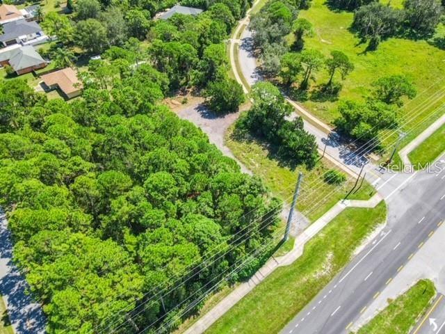 Don't miss this rare opportunity to own .69 acres of strategically located commercial land in Volusia county. Perfect for commercial visibility and exposure, this property offers main road frontage on S Ridgewood Ave, access to utilities, minutes away from New Smyrna Beach!
Excellent location. Corner lot on main road. Zoned B-4 General commercial classification and R-3 Urban single family residential. Land size approximate 100x300. Priced to sell. Offers welcomed!