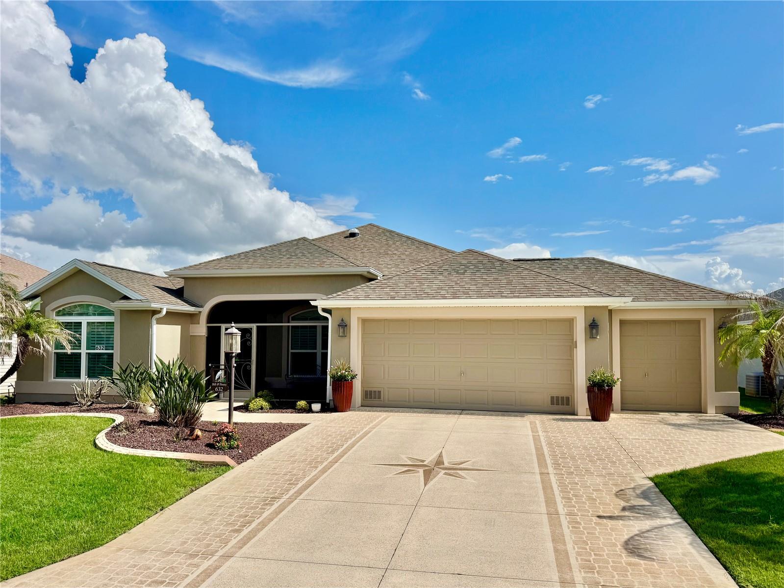 NO BOND~IMMACULATE TURNKEY GARDENIA~NO CARPET~ PLANTATION SHUTTERS~GRANITE COUNTERS~CROWN MOLDING THROUGHOUT~COLOR COATED CONCRETE~2 SOLAR TUBES~MAGIC  STAIRS~Welcome to 632 Coronaca Court, where timeless elegance meets exceptional comfort in one of The Villages’ most desirable neighborhoods. This beautifully maintained 1,957 sq. ft. home, built in 2016, offers an impressive blend of quality craftsmanship, thoughtful upgrades, and inviting living spaces. This home has STRIKING CURB APPEAL with color coated driveway and walk, professional landscaping, and a welcoming screened front entry. The custom decorative glass front door opens to an elegant interior with crown molding, soaring ceilings, neutral tile flooring, abundant natural light, and an open-concept design perfect for everyday living and entertaining.The gourmet kitchen is the heart of the home, showcasing stacked rich wood cabinetry with crown detail, granite countertops, stainless steel appliances, under-cabinet lighting, a tile backsplash, and a large breakfast bar overlooking the spacious LIVING ROOM and formal DINING ROOM.Retreat to the LARGE owner’s suite featuring DUAL WALK-IN CLOSETS, a beautifully updated walk-in shower with designer fixtures, while guests will appreciate the custom Murphy bed and built-in cabinetry, creating the perfect flexible guest room or office.One of the home’s standout features is the expansive climate-controlled enclosed lanai with mini-split HVAC, seamlessly extending your living space year-round. Whether enjoying morning coffee, entertaining friends, or relaxing with a book, this versatile room offers the perfect Florida lifestyle. The location can’t be beat with Shopping, Golf, Pools, Restaurants, and an abundance of Recreation center activities. Call me for your appt. Today.
