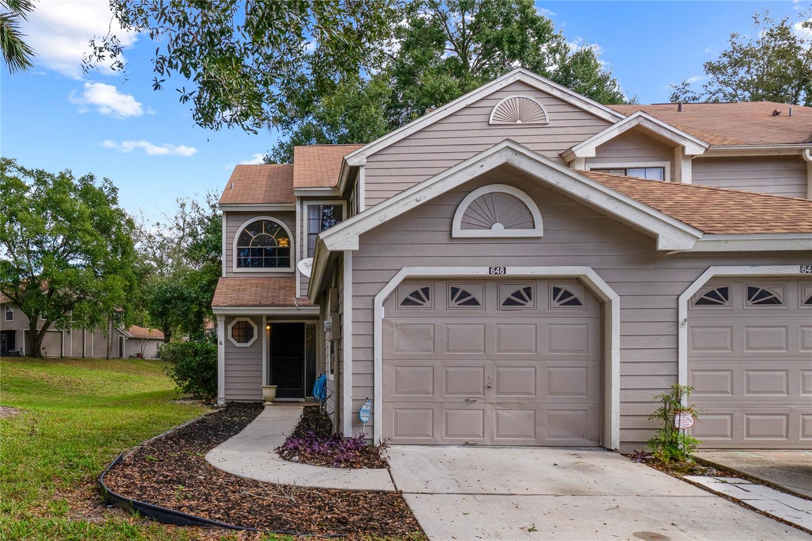Great opportunity in a perfect location - welcome to Northbridge at Country Creek! This light, bright and spacious 2BD/2.5BA townhome is full of UPDATES, freshly painted and ZONED FOR TOP-RATED SCHOOLS! This CORNER UNIT delivers a beautiful kitchen with new appliances, RENOVATED BATHROOMS, new outlets, NEW LUXURY VINYL PLANK FLOORS and a generous FLEX SPACE! From your foyer you have access to the kitchen as well as a line of sight straight through to the screened lanai adding to the light and bright feel! Your kitchen has been thoughtfully updated to include GRANITE COUNTERTOPS, new STAINLESS STEEL APPLIANCES, plenty of cabinet and pantry storage, tiled backsplash and breakfast bar and dinette seating for casual dining with family or entertaining friends. The open living and dining is a comfortable and inviting space with sliding glass door access to the screened lanai. At the top of the stairs a versatile loft awaits, whether you need a second living area, office space, home gym - the possibilities are endless! The generous PRIMARY SUITE is another bright space under a VAULTED CEILING with DUAL CLOSETS and your private bath has been updated in modern but timeless finishes that include a DUAL SINK VANITY, decorative mirrors and lighting and a large CUSTOM TILED SHOWER! The second bedroom is also a great size with access to the second full bath, also updated. For convenience there is also a HALF BATH on the main floor. Conveniently located in the heart of Altamonte Springs with easy access to I-4 and great amenities! The low HOA makes this a great first home or ideal investment property. Call today to schedule your showing and fall in love with this updated home in an established and well maintained community!