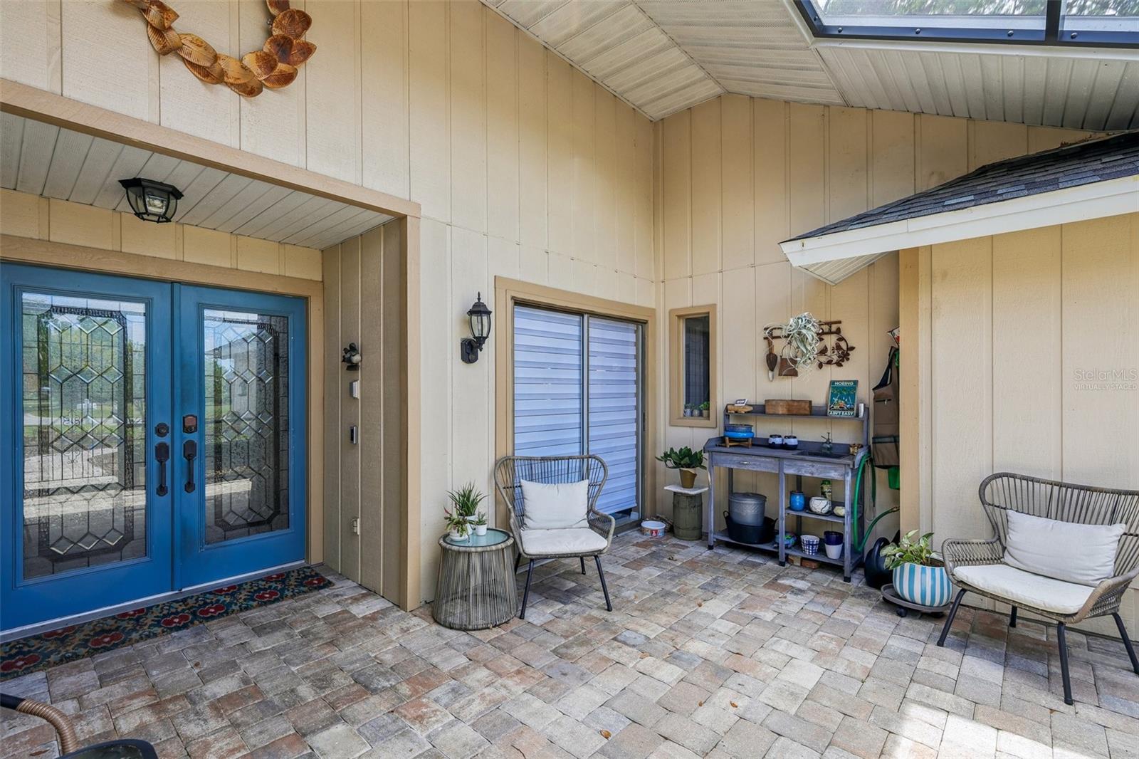 Nestled on an oversized, oak-shaded lot in the highly sought-after Country Place subdivision, this exceptional 3-bedroom, 3-bathroom home delivers Sarasota charm with serious modern peace of mind. The property has been meticulously updated, highlighted by a complete replumb and brand-new flooring throughout the main living areas and primary suite in 2025, plus impact-resistant windows in the Florida room, a roof replaced in 2018, and dual A/C units replaced in 2017 and 2021. Outdoors, a heated screened-in pool anchors a lush backyard retreat maintained effortlessly by an in-ground sprinkler system on a private well. The thoughtful floor plan offers exceptional privacy, with walk-in closets in all three bedrooms, a primary suite with pool access, and a second en-suite with its own private entrance and patio, ideal for guests or multi-generational living.