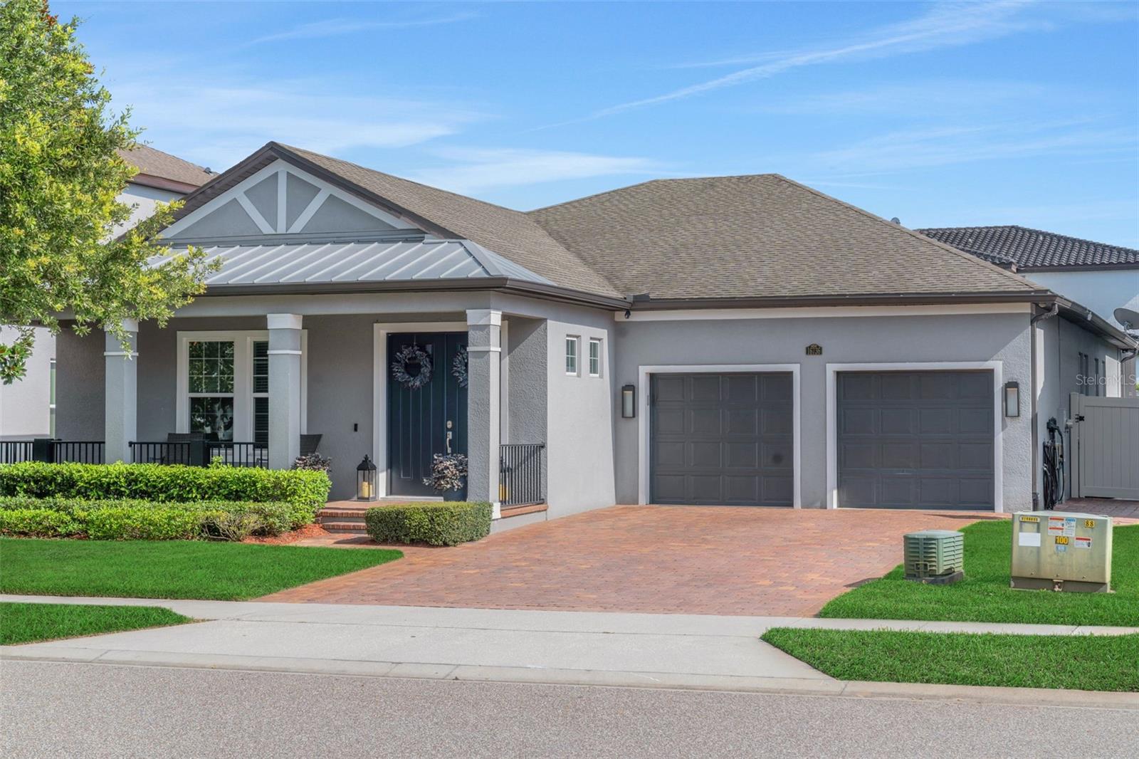 Incredible opportunity in sought-after Twinwaters.  Built in 2018, this beautifully maintained and HIGHLY UPGRADED, energy-efficient POOL residence is move-in ready and offers the perfect combination of comfort, style, and functionality. The thoughtfully designed 4-bedroom, 3.5 bath ONE-LEVEL Avallon floor plan features an expansive gourmet kitchen that seamlessly overlooks the spacious family room, creating an ideal setting for everyday living and effortless entertaining. The adjoining breakfast nook with extended built-in cabinetry and an additional dedicated beverage refrigerator is perfect for morning coffee, casual meals, or gathering with family and friends. The "pocket office" just off the kitchen ensures no space is wasted and makes for unbelievable utility with everything you need right at your fingertips. From the custom wall treatments, crown molding, and upgraded light fixtures to the tranquil brick paver front porch to enjoy the neighborhood, you won't sacrifice a thing at this home. The generously sized primary suite serves as a private retreat with two walk-in closets, dual vanities, and a well-appointed en-suite bath.  All bedrooms boast walk-in closets, making storage a breeze.  The sparkling pool is the center of outdoor entertainment and is screened-in, surrounded by manicured grounds.  Residents of Twinwaters enjoy exceptional community amenities, including a resort-style swimming pool, park, and playground, all within a convenient location close to great schools, shopping, dining, and major roadways. Designed with advanced energy-efficient construction, this home promotes a healthier, quieter lifestyle while helping reduce monthly utility costs.  This property may be under audio/visual surveillance.