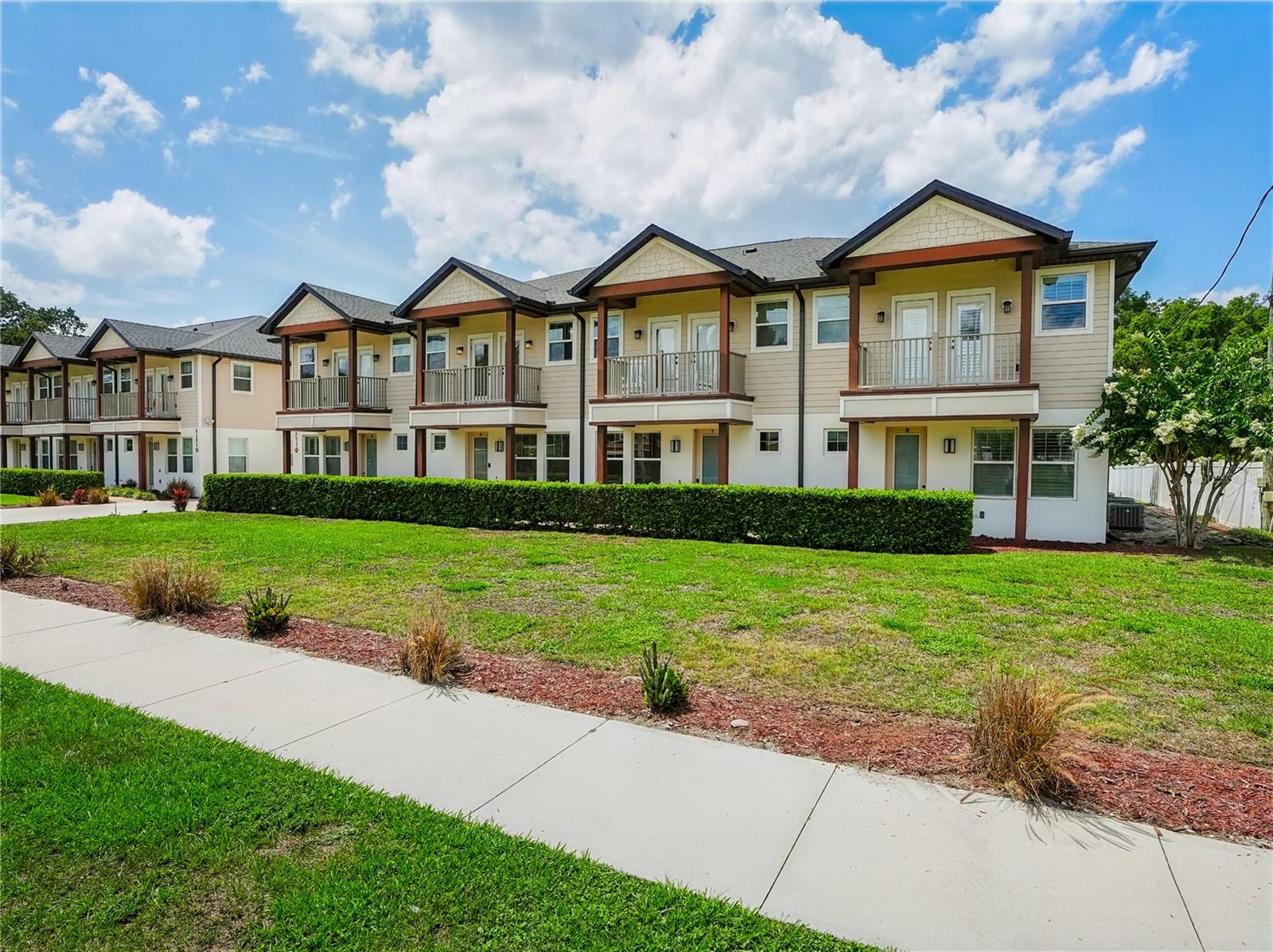 Luxury New Townhome in Prime Orlando Location! Located on a quiet street just minutes from Downtown Orlando, SoDo, Thornton Park, College Park, and major hospitals, this spacious 3-bedroom, 2.5-bathroom townhome with a bonus/flex room offers high-end finishes and a thoughtfully designed open floor plan. The interior boasts white shaker-style wood cabinetry with soft-close drawers, exotic granite countertops, stainless steel appliances, whitewashed porcelain “wood-look” tile flooring, and designer plumbing and light fixtures throughout. The oversized primary suite is a true retreat, featuring a massive walk-in closet, a private lounge or desk nook, a spa-like bathroom with a double rainfall shower and dual vanities, and French doors that open to a private 20x8 sun deck. Each additional bedroom has access to a covered balcony, providing added space and outdoor enjoyment. Additional features include an oversized 2-car attached garage with ample storage space, a fully fenced yard for privacy and security, and a bonus room that can function as a fourth bedroom, office, or flex space. Enjoy the feel of a single-family home with the convenience of maintenance-free luxury living. Pet-friendly. Lawn maintenance included. Immediate occupancy available.