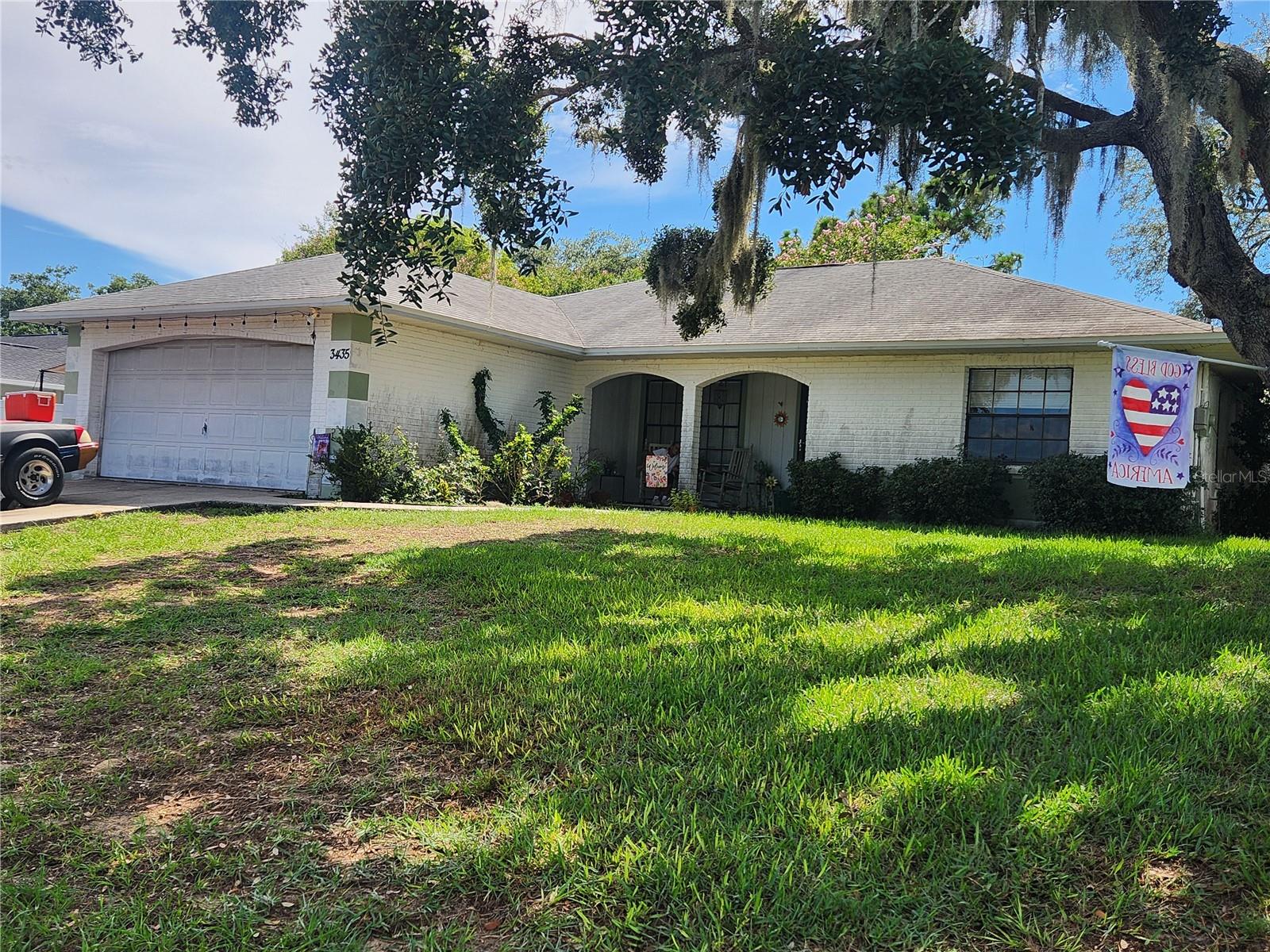 Great starter home waiting for you to add your loving touch & make it your home! Three bedrooms, two bathrooms. Living room with sliding doors to screen patio overlooking fenced yard so bring the family & bring the pets and enjoy! Two car garage and driveway for multiple vehicles.
