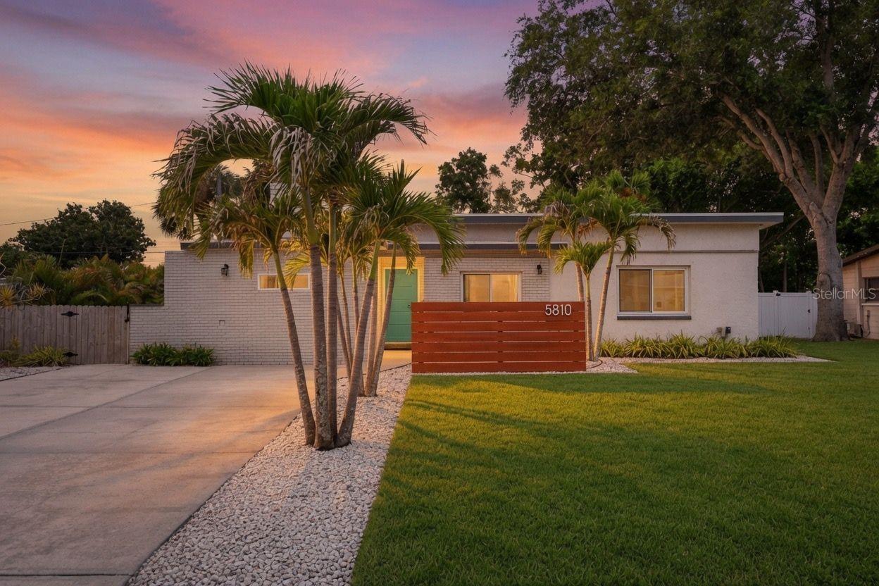 Welcome to your own private oasis in vibrant Gulfport! Thoughtfully updated and full of character, this Mid-Century Modern 3-bedroom, 3-bath home offers 1,926 square feet of beautifully designed living space, a private pool, an expansive screened enclosure, and a detached pool house—all less than a mile from downtown Gulfport. From the moment you step inside, you'll notice the warmth and character of the home, highlighted by engineered hickory hardwood floors and a spacious, functional layout. All three bedrooms are generously sized with ample closet space, and two feature private ensuite bathrooms. The oversized primary suite offers exceptional closet space and a spacious ensuite with a double vanity, while another ensuite bedroom features an updated walk-in shower. At the heart of the home, the open kitchen features cabinetry with crown molding and soft-close doors, granite countertops, stainless steel appliances, and plenty of space to gather. Just off the kitchen, a dedicated dining area flows into a dry bar with a wine fridge, creating the perfect setup for entertaining. The outdoor living space is where this home truly shines. A huge screened enclosure surrounds the private pool, creating an incredible extension of the living space for relaxing, entertaining, and enjoying Florida living year-round. The pool features a Pebble Sheen finish, complemented by an outdoor shower and a fully fenced backyard. Just beyond the pool, the detached 16-by-16 permitted pool house offers valuable bonus space and is currently used as a home office, with endless possibilities for a studio, fitness room, creative retreat, or additional flex space. Extensive improvements include a newer HVAC system, updated windows, impact-rated exterior doors, a 200-amp electrical panel, updated wiring and plumbing, insulation, and more. Additional conveniences include a dedicated office/flex space build-out off the dining room and a level 2 electric vehicle charger included. Located less than a mile from the Gulfport waterfront and just minutes from the locally loved shops, restaurants, bars, and vibrant community along Beach Boulevard, this home offers the space, character, and indoor-outdoor lifestyle that make Gulfport living so special.