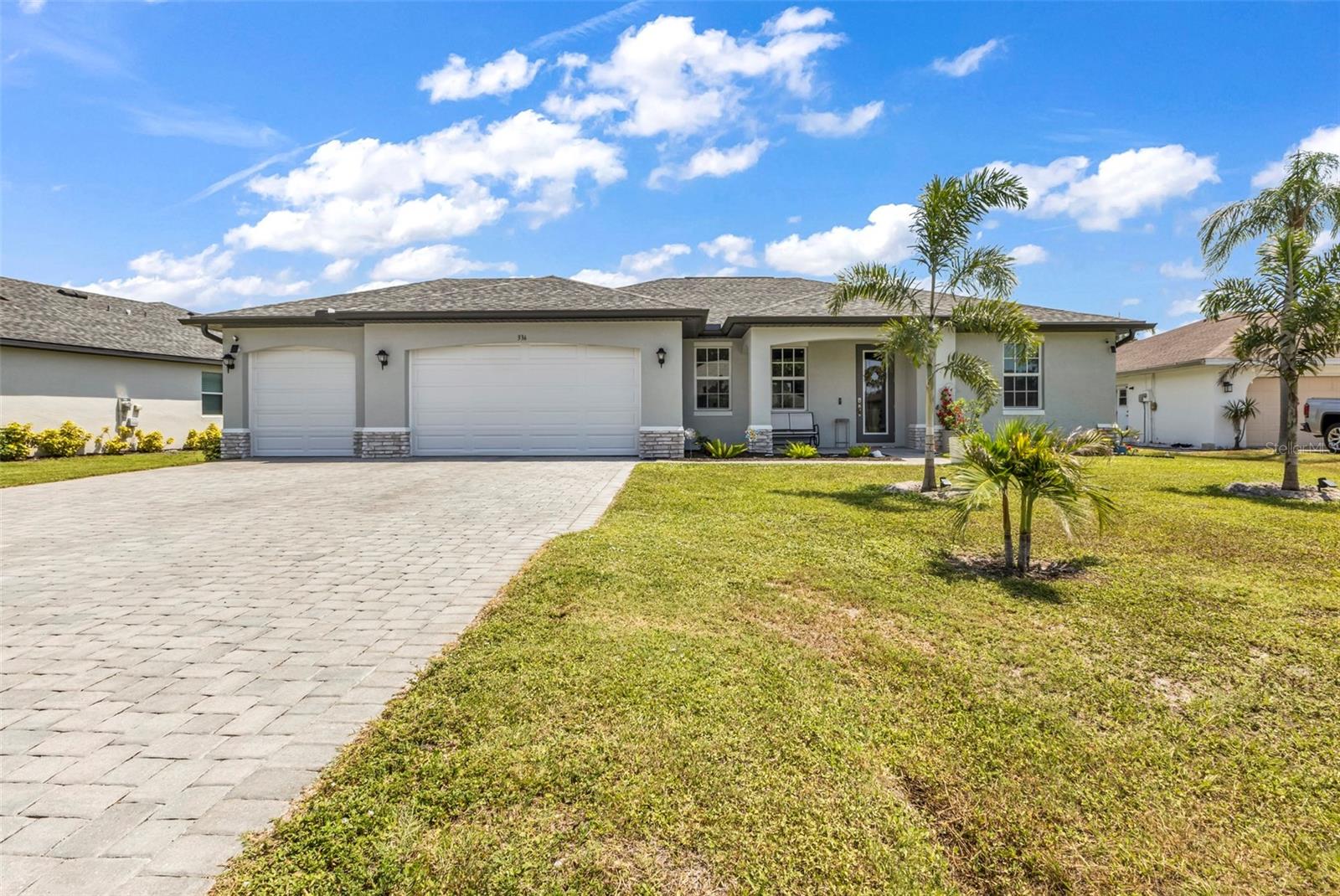 STUNNING 2023 POOL HOME IN DEEP CREEK – FLORIDA LIVING AT ITS FINEST!

Welcome to this exceptional 4-BEDROOM, 2-BATH POOL HOME located in the highly desirable deed-restricted community of Deep Creek. Perfectly positioned on a quiet cul-de-sac, this beautifully crafted residence offers the ideal combination of modern luxury, privacy, and the Southwest Florida lifestyle you've been dreaming about.

Imagine starting your mornings with a cup of coffee by the pool, enjoying the peaceful surroundings and private backyard setting, while still benefiting from the security and pride of ownership that comes with a well-maintained HOA community.

Built in 2023, this home features a spacious 3-CAR GARAGE with EPOXY FLOORING, dimensional roof shingles, decorative STONE ACCENTS, and impressive curb appeal. Inside, you'll find an open-concept floor plan with soaring 9'4" tray ceilings, 8-foot doors, and beautiful 12x24 TILE FLOORING THROUGHOUT—no carpet anywhere.

The chef-inspired kitchen is designed for both everyday living and entertaining, featuring a large CENTER ISLAND with seating, GRANITE countertops, raised-panel soft-close cabinetry, stainless steel appliances, and a spacious CLOSET PANTRY. The GREAT ROOM seamlessly opens to the expansive screened lanai, creating the perfect indoor-outdoor living experience.

Step outside to your private backyard oasis featuring a HEATED SALTWATER POOL with a zero-entry sloped design for easy access, custom paver deck, and plenty of space to relax, entertain, or simply enjoy Florida's year-round sunshine.

The split-bedroom floor plan offers privacy for family and guests, along with a dedicated office/flex space. Two guest bedrooms feature double-door closets and ceiling fans and share a well-appointed guest bath with granite countertops and a tub/shower combination.

The luxurious primary suite is a true retreat with tray ceilings, dual walk-in closets, private lanai access, and a spa-inspired bathroom featuring dual vanities with granite countertops and an oversized glass walk-in shower.

Additional premium features include:

• PGT HURRICANE IMPACT WINDOWS & DOORS – No shutters required during hurricane season
• Remote-operated Kevlar lanai screens
• Sprinkler system and seamless gutters
• 50-amp hookup for a portable generator
• Quality construction and thoughtful upgrades throughout

Offering the perfect blend of privacy, luxury, and convenience, this move-in-ready home allows you to embrace the Florida lifestyle while enjoying all that Deep Creek has to offer. Whether you're relaxing poolside, entertaining friends, or enjoying your morning coffee in the lanai, this home is designed to make every day feel like a vacation.