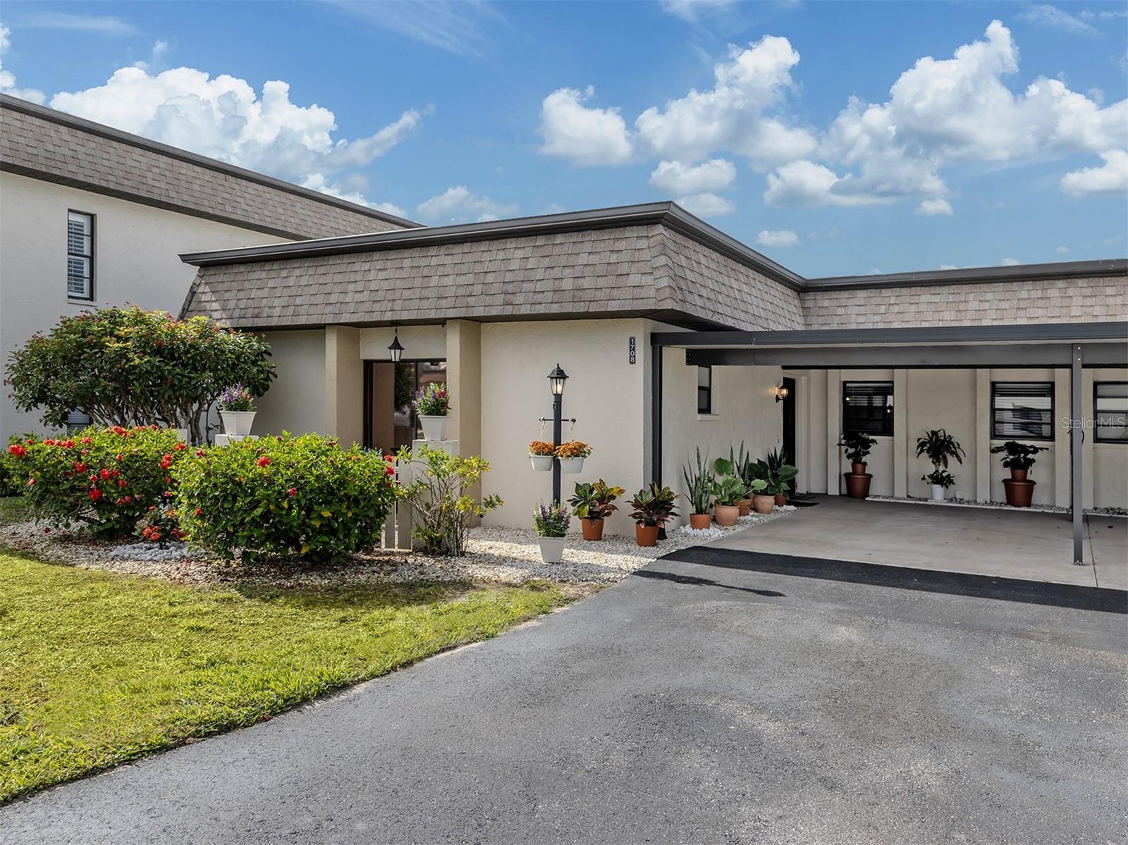 Newly remodeled and beautifully updated first-floor paired villa offering the privacy of no unit above. Enjoy a relaxed, low-maintenance lifestyle in this friendly 55 plus community. This move-in-ready home features a new roof and HVAC system (2025), new luxury vinyl plank flooring throughout, and a freshly painted interior down to the baseboards. The completely redesigned kitchen showcases new cabinetry, granite countertops, tile backsplash, updated sink and faucets, modern appliances, and a finished ceiling with LED lighting and a ceiling fan. Additional upgrades include an enhanced laundry room with new washer, dryer and cabinetry for additional storage. A standout feature is the bonus enclosed lanai, heated and cooled with dedicated vents, finished with new LVP flooring and baseboards, providing versatile additional living space year-round. Additional improvements include new bathroom vanities, new Square D electrical panel and outdoor water main shutoff plus a thoughtfully renovated carport completed just three years ago. Every detail has been carefully considered, making this an exceptional opportunity for carefree Florida living. Villa Nova boasts a community pool and clubhouse for social and recreational activities, plus it’s in a prime location near an array of shopping, dining and cultural options. It's also a short drive to charming Venice Island, where 14 miles of pristine beaches meet the sparkling Gulf Coast. All this comes together to ensure an exceptional blend of comfort, style and everyday convenience. Imagine the possibilities. Be inspired!