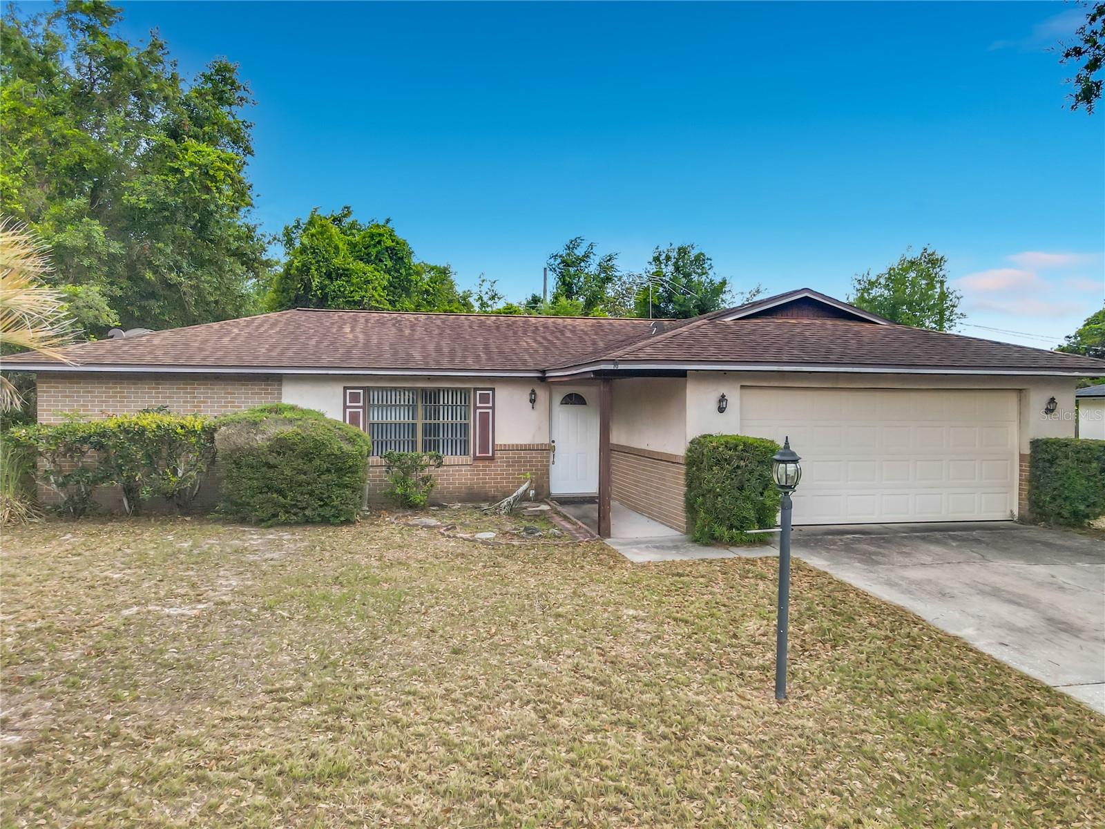 This 2-Bedroom, 2-Bath Home With A 2-Car Garage Features A Functional Floor Plan With A Combined Living And Dining Area, A Cozy Kitchen With Stove, Dishwasher, And Microwave, Plus A Bright Florida Room Overlooking The Private Backyard. This Home Has Solid Bones And Plenty Of Potential For The Right Buyer Ready To Bring Their Vision And Personal Style. Whether You're Looking For A Starter Home, Investment Property, Or A Space To Renovate And Make Your Own, This Property Offers A Blank Canvas To Create Something Special. Tucked Away On A Quiet Street. Split Floor Plan. Roof 2017. Newer Carpet. The Home Provides A Peaceful Setting While Still Being Close To I-4, Shopping And Medical. If You Have Been Searching For A Home With Character, Privacy, And Room To Update To Your Taste, This Could Be The Perfect Fit. Schedule Your Private Showing Today Before This Opportunity Is Gone.