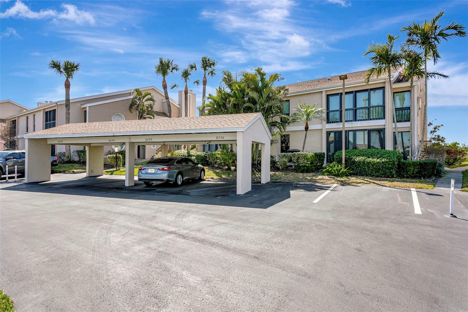 Welcome to Bay Hollow — a rare opportunity to own a beautifully maintained ground floor waterfront condo complete with stunning views, a deeded private boat dock, and access to a sparkling community pool.

This spacious 2-bedroom, 2-bath residence offers 1,561 square feet of thoughtfully designed living space filled with natural light. The open-concept layout creates an inviting atmosphere, featuring a warm and cozy fireplace in the living room — perfect for relaxing evenings or entertaining guests.

Step out onto your private balcony and take in the peaceful waterfront scenery — an ideal setting for morning coffee or evening sunsets. Boating enthusiasts will appreciate the convenience of direct access to the Intracoastal Waterway right from their own dock.

The primary suite includes a walk-in closet and a private en-suite bath, while the guest bedroom and second full bath provide comfort and privacy for family and visitors. Additional highlights include in-unit laundry, generous storage space, and covered parking.

Residents of this well-maintained community enjoy lush landscaping, a refreshing pool, and a relaxed coastal lifestyle just minutes from the beautiful beaches of Anna Maria Island, the historic charm of Cortez Fishing Village, the renowned IMG Academy, as well as shopping, dining, and local golf courses.

Whether you’re searching for a full-time residence, seasonal retreat, or investment opportunity, this waterfront gem truly has it all.

Don’t miss your chance to own your slice of paradise — schedule your private showing today!
Parking space is 8734/Boat slip # 6