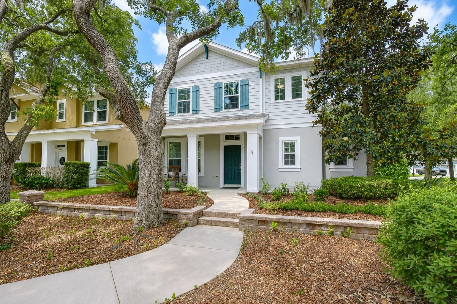 Beautifully updated from top to bottom, this exceptional David Weekley home is tucked away on a private, tree-lined corner lot in the highly sought-after Starling village of FishHawk Ranch. With thoughtful upgrades throughout and an unbeatable location, this move-in-ready home offers the perfect blend of comfort, style, and convenience. From the moment you arrive, you’ll appreciate the charm of the shaded streets, welcoming covered front porch, and peaceful setting. Inside, the home has been extensively upgraded with attention to every detail — from new light fixtures and switch covers to upgraded baseboards, French return shades, newer kitchen appliances, and a new A/C system. Every space has been carefully refreshed, creating a home that feels modern, polished, and truly turnkey. The spacious floorplan features 3 bedrooms, 2.5 bathrooms, a dedicated home office/den, and an upstairs bonus room. Wood-look flooring flows throughout the main living areas, while the open-concept design creates an ideal space for both everyday living and entertaining. At the heart of the home is the beautifully remodeled kitchen, designed to blend style, function, and everyday living. Featuring striking two-toned cabinetry, granite countertops, updated hardware, tile backsplash, and newer stainless appliances — including a gas range — this space feels both modern and inviting. Thoughtfully designed for entertaining and gathering, the kitchen opens seamlessly to the spacious living and dining areas, creating the perfect flow for hosting family and friends or simply enjoying day-to-day life. Recessed and pendant lighting add warmth and character, while the abundant cabinet space and pantry provide exceptional storage. The first-floor primary suite is a relaxing retreat featuring crown molding, an oversized walk-in closet, dual sink vanity, soaking garden tub, and shower. Upstairs, you’ll find two generously sized bedrooms, a full bath, and a versatile bonus room perfect for a media space, playroom, or second living area. Step outside to enjoy the covered rear lanai and fenced backyard, all set on a spacious corner homesite with ample guest parking nearby. The location truly sets this home apart — enjoy a short 10-minute walk to Lithia Springs, bike paths leading directly to top-rated schools and FishHawk Sports Complex, plus easy access to the Starling Club, community center, pools, parks, tennis courts, fitness centers, and miles of scenic walking trails. This meticulously maintained and extensively upgraded home offers the lifestyle FishHawk Ranch is known for — all in one of the community’s most desirable locations.