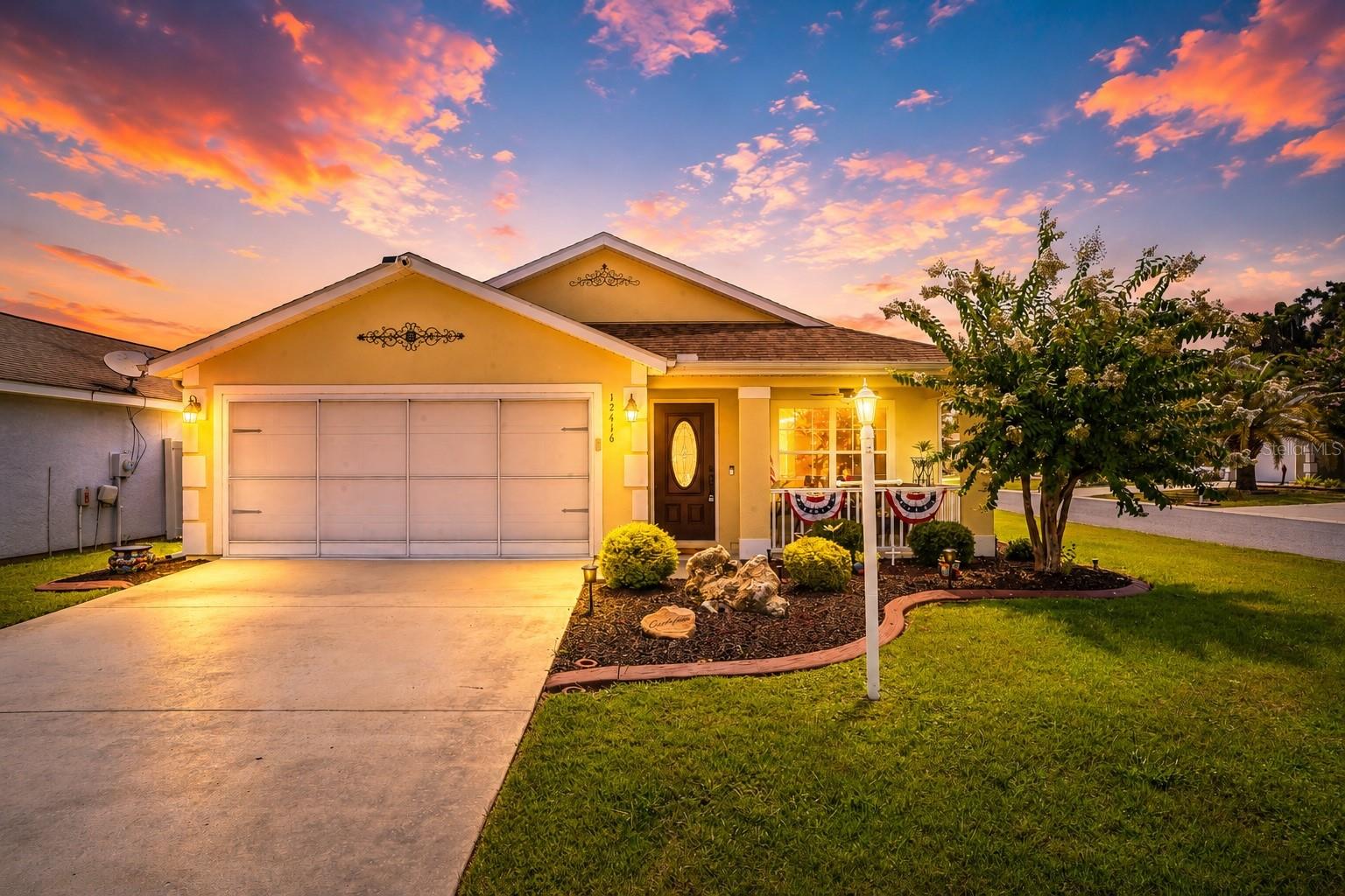 Move-in ready, Absolutely Charming, 3-bedroom home in Oxford, FL, just minutes from The Villages!

Welcome home to this beautifully maintained, one-of-a-kind residence tucked away on a peaceful corner lot in the back of the highly desirable Parkwood community in Oxford. Offering 3 bedrooms, 2 bathrooms, and 1,662 square feet of thoughtfully designed living space, this home combines comfort, style, and convenience in a location that's hard to beat.

Just minutes from The Villages®, you'll enjoy easy access to shopping, dining, entertainment, medical facilities, and the highly acclaimed charter school—while still appreciating the quiet charm of a neighborhood you'll be proud to call home.

From the moment you arrive, you'll notice the care and pride of ownership. Fresh landscaping, decorative curbing, durable rubber mulch, and a brand-new hurricane-rated front door create an inviting first impression. Step inside to discover a unique floor plan not commonly found within Parkwood, offering an open, welcoming layout that's perfect for both everyday living and entertaining.

The spacious kitchen is the heart of the home, featuring gorgeous granite countertops, an abundance of cabinetry for all your storage needs, and a full suite of LG stainless steel appliances installed in 2023. Stylish upgraded lighting and ceiling fans add a modern touch throughout the home, while tinted windows help keep the interior cool and energy efficient year-round.

Retreat to the private, vinyl-fenced backyard where you'll find beautiful New England river rock, creating a clean, low-maintenance outdoor space that's perfect for relaxing, entertaining, or letting pets play freely.

Thoughtful upgrades provide peace of mind for years to come, including a newer HVAC system (2023) complete with a transferable 10-year warranty, a SECO whole-house surge protector, ADT security system, Ring video doorbell, rain gutters, garage screen, and even a gopher deterrent system.

Whether you're searching for your first home, your forever home, or simply a place where every detail has already been thoughtfully cared for, this exceptional Parkwood property offers the perfect blend of comfort, convenience, and value. Schedule your private showing today and discover why this home truly stands apart from the rest.