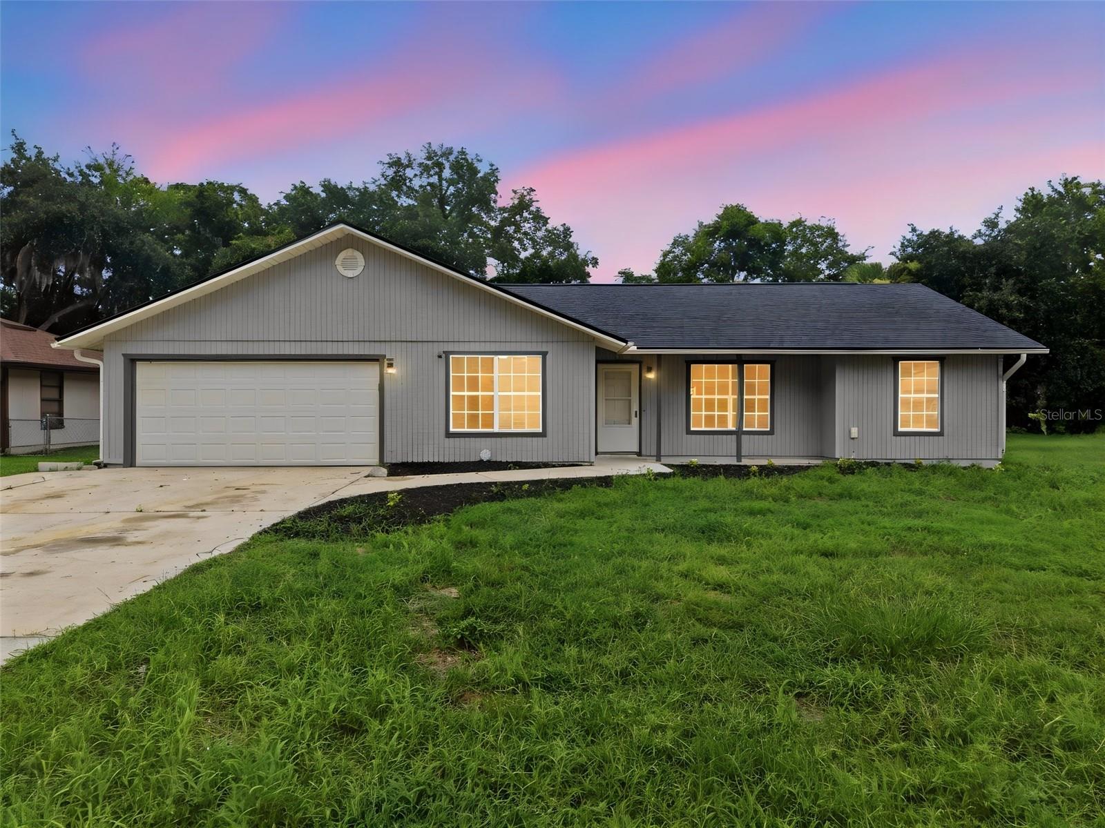 Welcome to 2509 JUNIPER DRIVE, EDGEWATER, FL 32141, a beautifully remodeled one story home. This beautifully updated 3-bedroom, 2-bath home offering comfort, style, and peace of mind. Recent improvements include HVAC installed in May 2026, roof installed in June 2026, luxury vinyl plank flooring throughout, updated kitchen cabinets and appliances, modern countertops, and contemporary lighting fixtures. The bright and inviting floor plan flows seamlessly to a screened porch and an open rear patio, crating the perfect space to relax while enjoying Florida's year round weather. No HOA restrictions, and the backyard offers added privacy with neighboring homes situated a significant distance from the rear property line. Conveniently located near shopping, dining, parks, boating, and the beautiful beaches of New Smyrna Beach, this move-in ready home is an exceptional opportunity to enjoy the Florida lifestyle.