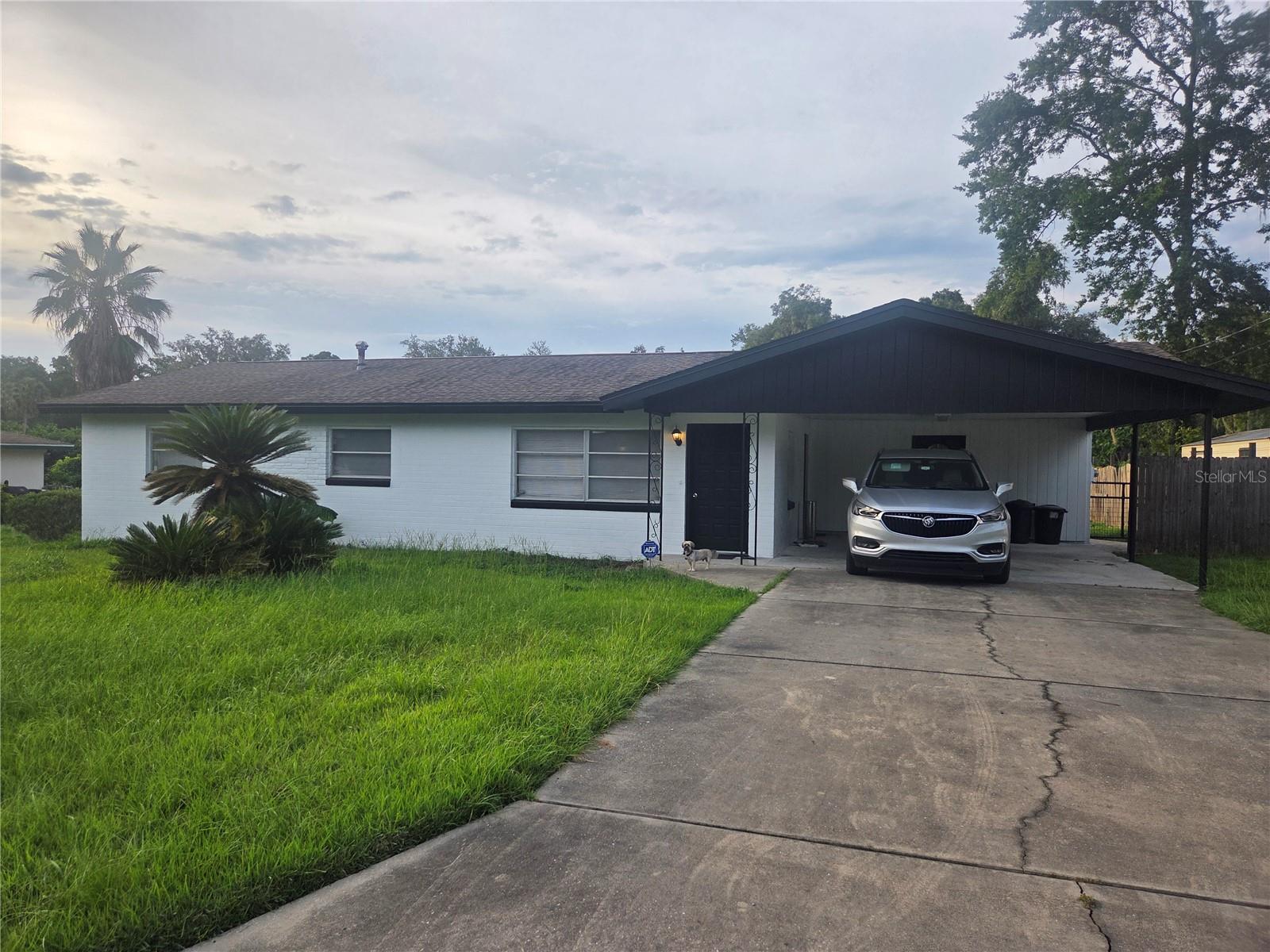 Great Location!! Cose to downtown but on quiet street.  , Solid block home..  3 bedrooms 2 full  bath, florida room  and Double  carport. Fresh paint inside and out with some updates but needs work . Nice large lot with  concrete block shed/workshop/storage. and Large in ground pool.
 All measurements should be verified, no warranties given.
This is a Must See Fixer Upper. Sold As Is,, do Inspections .Cash Only offers considered, No subject to or assignable contracts.