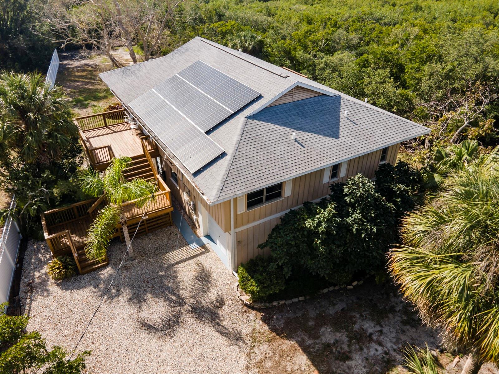 1980's Florida Home nestled on a private and secluded property at 5060 Lemon Bay Drive. This charming house is now available for sale and offers a fantastic opportunity for those seeking a tranquil retreat.  As you step inside, you'll be greeted by an open concept floor plan that allows for seamless flow throughout the home. The stainless-steel appliances in the kitchen add a modern touch, while the abundance of windows ensures plenty of natural light floods in, creating a warm and inviting atmosphere.  The massive great room is perfect for entertaining guests or simply enjoying quality time with loved ones. You'll also find wrap-around decks and a screened porch where you can relax and soak up the serene surroundings.  The primary bedroom boasts an en-suite bathroom complete with a large walk-in tile shower and a spacious walk-in closet. With direct access to the screen deck, you can easily step outside and enjoy your morning coffee amidst nature's beauty.  Featuring 16" ceilings and hardwood flooring in the main/common rooms, this home exudes charm and character. Situated on over 1 acre of land with a creek, you'll have the luxury of a dock for launching kayaks, canoes, and paddle boards.  For added convenience, a small annual fee to the South Venice Civic Association grants access to amenities such as the Venice Beach Ferry and a boat launch. Plus, you'll be just minutes away from Legacy Trail, perfect for outdoor enthusiasts.
Very easy to show.