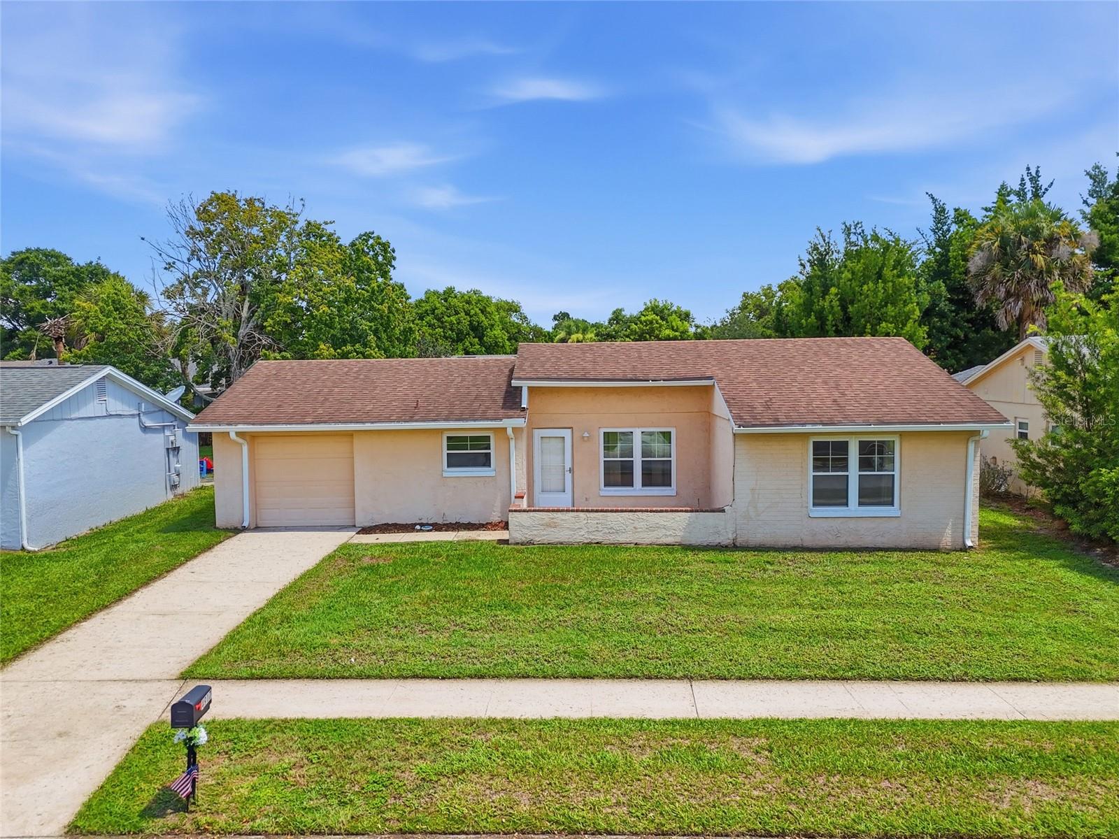 This meticulously maintained 2-bedroom, 2-bathroom single family home puts you steps from the magic — minutes to Disney, Universal, and SeaWorld, with easy access to major highways, premier dining, and endless entertainment. Whether you're seeking a primary residence, vacation retreat, or investment opportunity, this location can't be beat.

Inside, you'll find a completely renovated kitchen featuring newer cabinetry and gorgeous granite countertops, plus two beautifully updated bathrooms. Major updates offer true peace of mind: new A/C (2024), updated roof (2016), and all-new double-pane windows and sliding glass doors throughout. A one-car garage adds extra convenience.

HOA includes access to a community clubhouse and pool, plus lawncare — low-maintenance living at its best!

Don't miss your chance to own in Williamsburg — schedule your private showing today!
