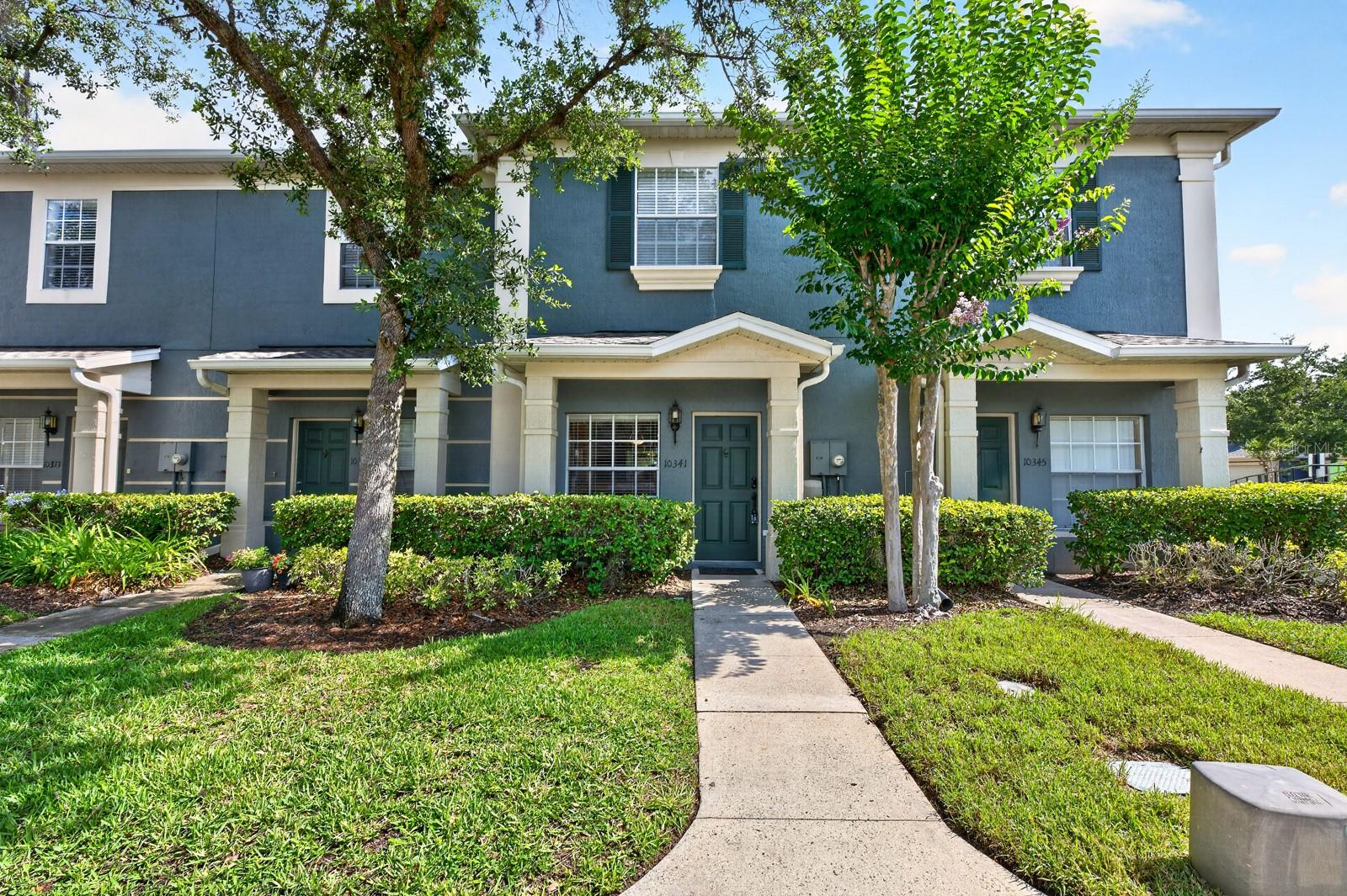 One or more photo(s) has been virtually staged. Welcome to Victoria Pines, where LOW MAINTENANCE LIVING meets MOVE-IN READY comfort, convenience, and a fantastic location in the heart of East Orlando! Perfectly situated on a quiet CUL-DE-SAC street at the back of the community, this beautifully maintained townhome enjoys peaceful POND VIEWS, charming curb appeal, and access to desirable amenities including GATED ENTRY and a COMMUNITY POOL. Step inside to discover a light-filled, OPEN CONCEPT floor plan designed for easy everyday living and entertaining. WOOD-LOOK TIKE flooring flows throughout the living and dining areas, while an oversized sliding glass door draws in natural light and opens to a SCREENED LANAI overlooking the water. The lanai also features a convenient outdoor storage closet. The spacious kitchen is at the front of the home and offers STAINLESS STEEL APPLIANCES, a large window for abundant natural light, nice cabinet and counter space, and a breakfast bar that seamlessly connects to the dining area. The open layout creates a natural flow from the front door all the way to the backyard, making the home feel light, bright, welcoming, and connected. A convenient half bath is located on the main floor, while upstairs you will find a thoughtfully designed layout with both bedrooms featuring private en-suite baths. The PRIMARY SUITE at the back of the home offers tranquil pond views and a spacious bathroom, while the second bedroom provides flexibility for guests, roommates, or a home office. The second-floor laundry room adds everyday convenience right where you need it most. An ASSIGNED PARKING space, low-maintenance lifestyle, and move-in-ready condition make this home an exceptional opportunity for first-time buyers, professionals, investors, or anyone looking to enjoy easy living in a prime location. In a great central location near SR 417 and SR 408, with quick access to UCF, Valencia College, Avalon Park, Waterford Lakes Town Center, shopping, dining, entertainment, and everyday conveniences. Zoned for top-rated schools and located in an established community – Victoria Pines welcomes you HOME!