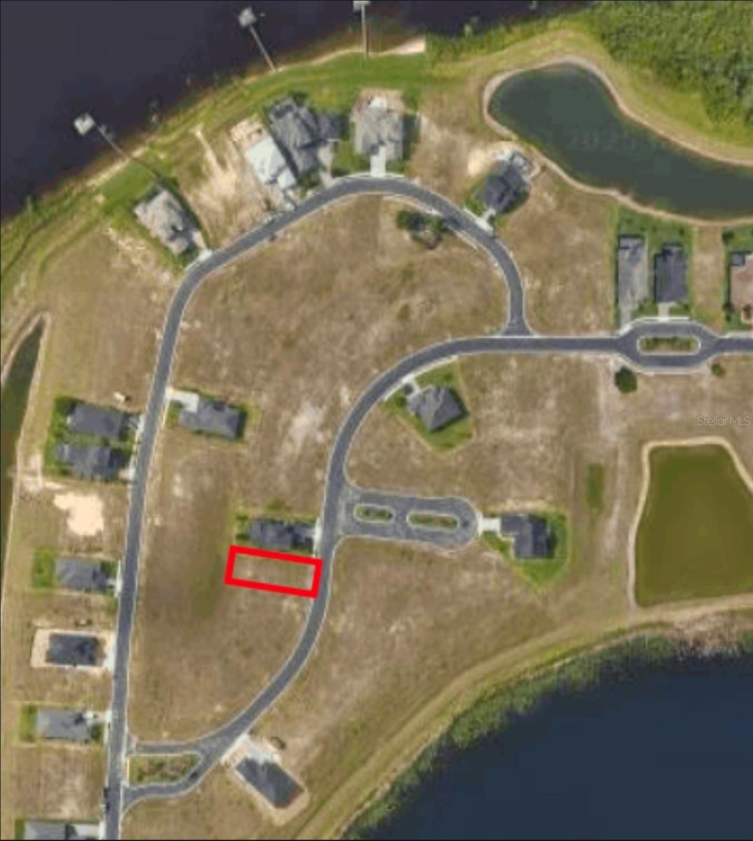 Build your custom dream home in the gated community of Water Ridge in Auburndale. This vacant interior lot offers the perfect opportunity to design a home tailored to your vision within one of Polk County’s most sought-after resort-style communities. Water Ridge features an impressive array of amenities, including a grand clubhouse, multiple swimming pools (including a lap pool), a fitness center with sauna and locker rooms, tennis, pickleball and basketball courts, scenic walking trails, fishing piers, and two private boat ramps with access to Lake Van and Lake Alfred. Enjoy the flexibility of bringing your own licensed and insured builder with no required timeframe to begin construction. Conveniently located near I-4, providing easy access to Orlando, Tampa, and surrounding areas. Don’t miss your chance to secure a homesite in this exceptional community.