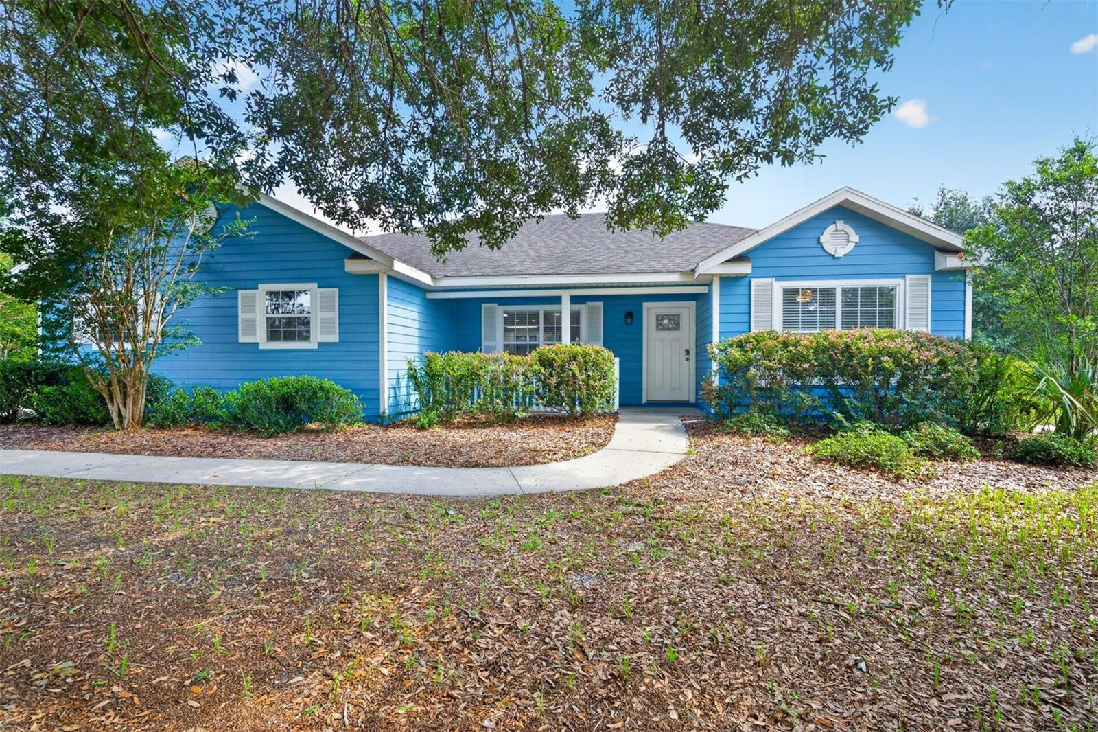 Rare Full-Acre Lot in Hammock Ridge — Move-In Ready with No Carpet, Flex Office & 2-Car Garage. 

Welcome to this beautifully maintained 4-bedroom, 2-bath home offering one of the most sought-after features in SW Gainesville: a full acre lot. Tucked into the desirable Hammock Ridge community, this 2004-built home spans approximately 1,703 sq. ft. and pairs everyday comfort with real flexibility. A dedicated office with a built-in Murphy bed and custom cabinetry means this room works as a home office today and a guest suite tomorrow.  The kitchen is outfitted with a full stainless steel appliance package — refrigerator, glass-top range, microwave, and dishwasher — and hard-surface flooring runs throughout the entire home, with zero carpet to replace or clean. Both bathrooms feature double-sink vanities, and a separate laundry room. Outside, the acre lot gives you room to garden, play, or simply spread out — a rare find in SW Gainesville. A 2-car garage adds everyday convenience, and residents enjoy access to the neighborhood playground. The home is zoned for Archer Elementary, Oak View Middle, and Newberry High.